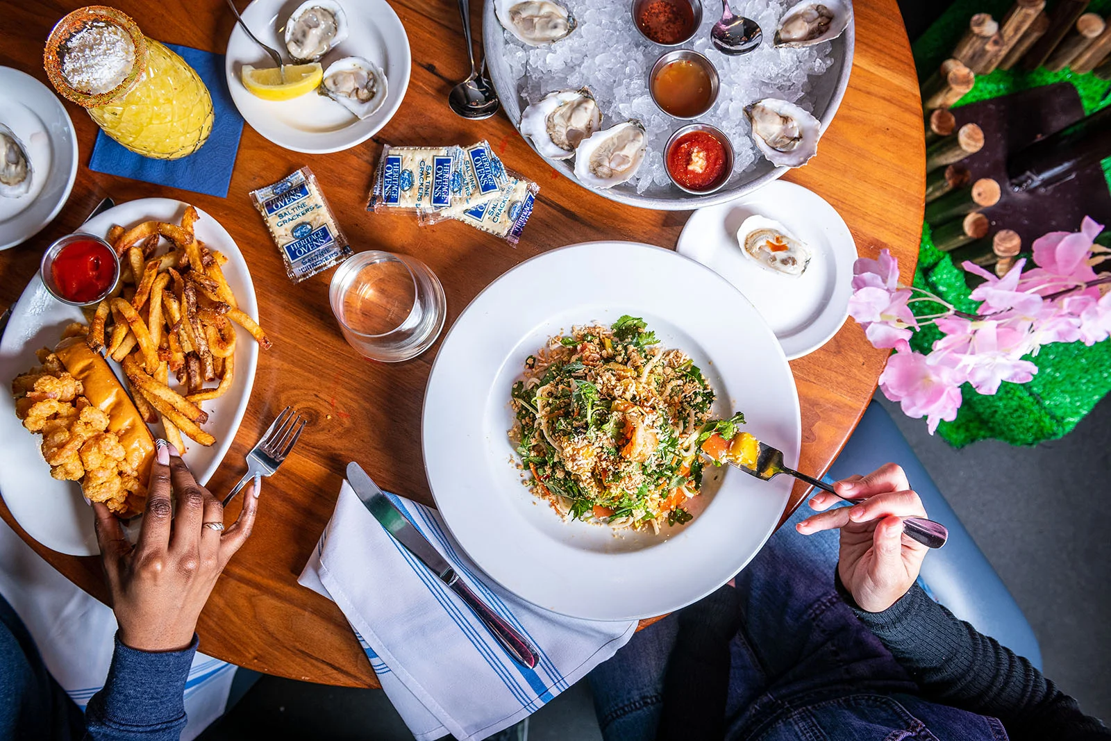 Seafood tower featuring shrimp, crab, and oysters