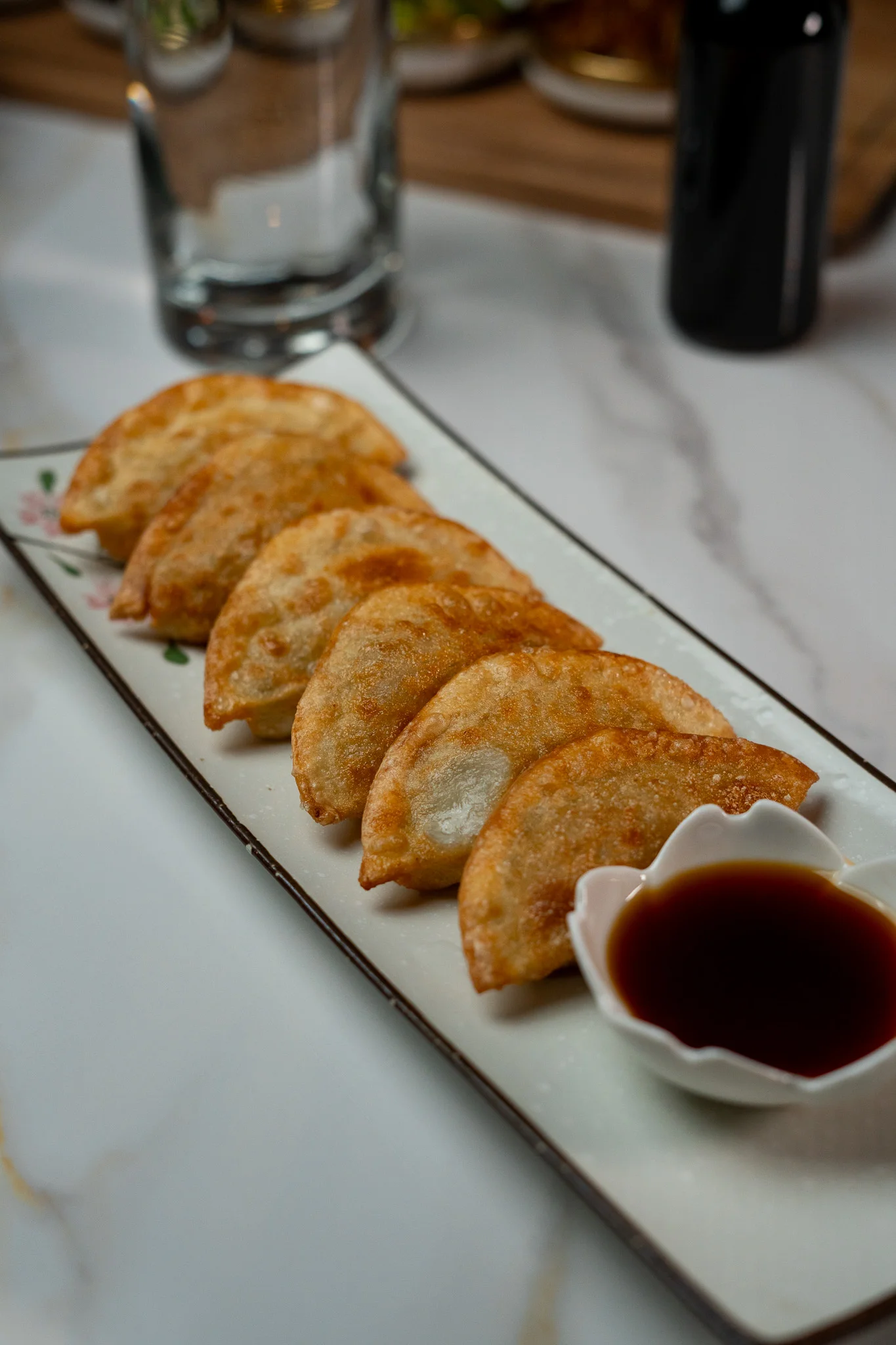 Crispy Japanese gyoza served with dipping sauce