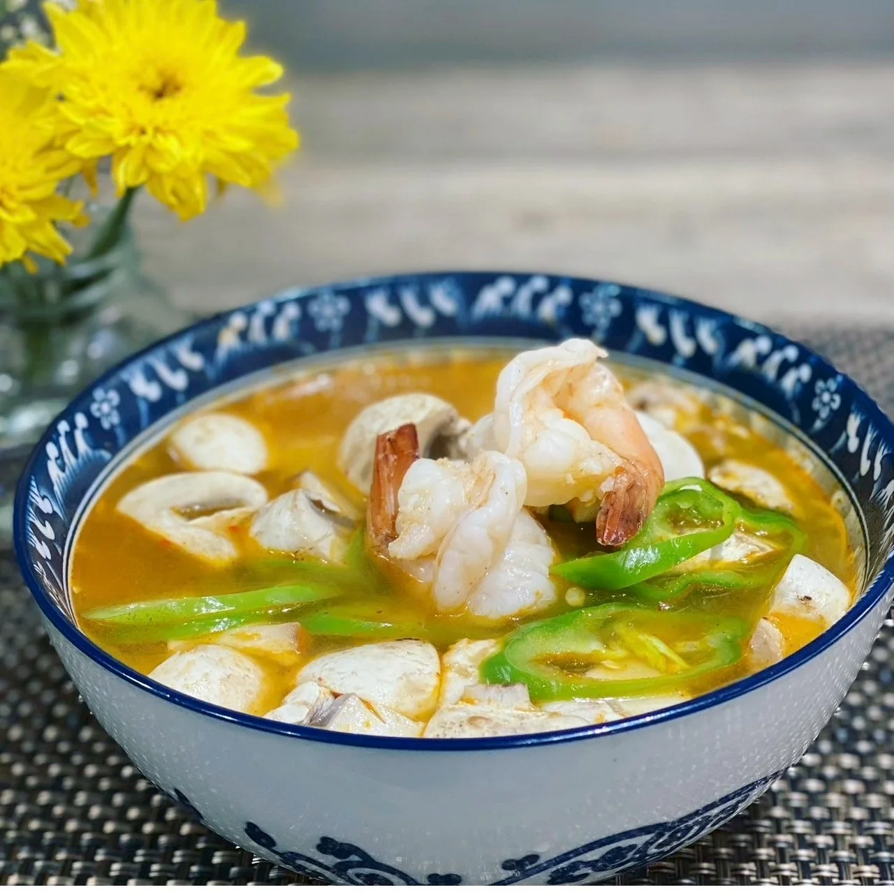 Spicy Thai tom yum soup with shrimp and mushrooms