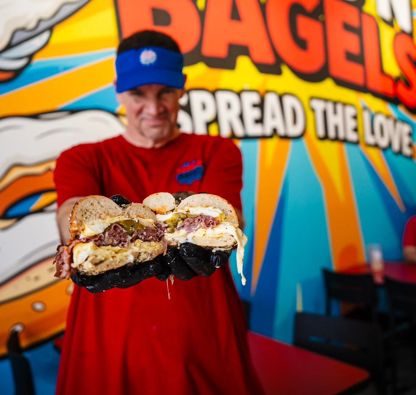 Loaded bagel sandwich with eggs and pastrami