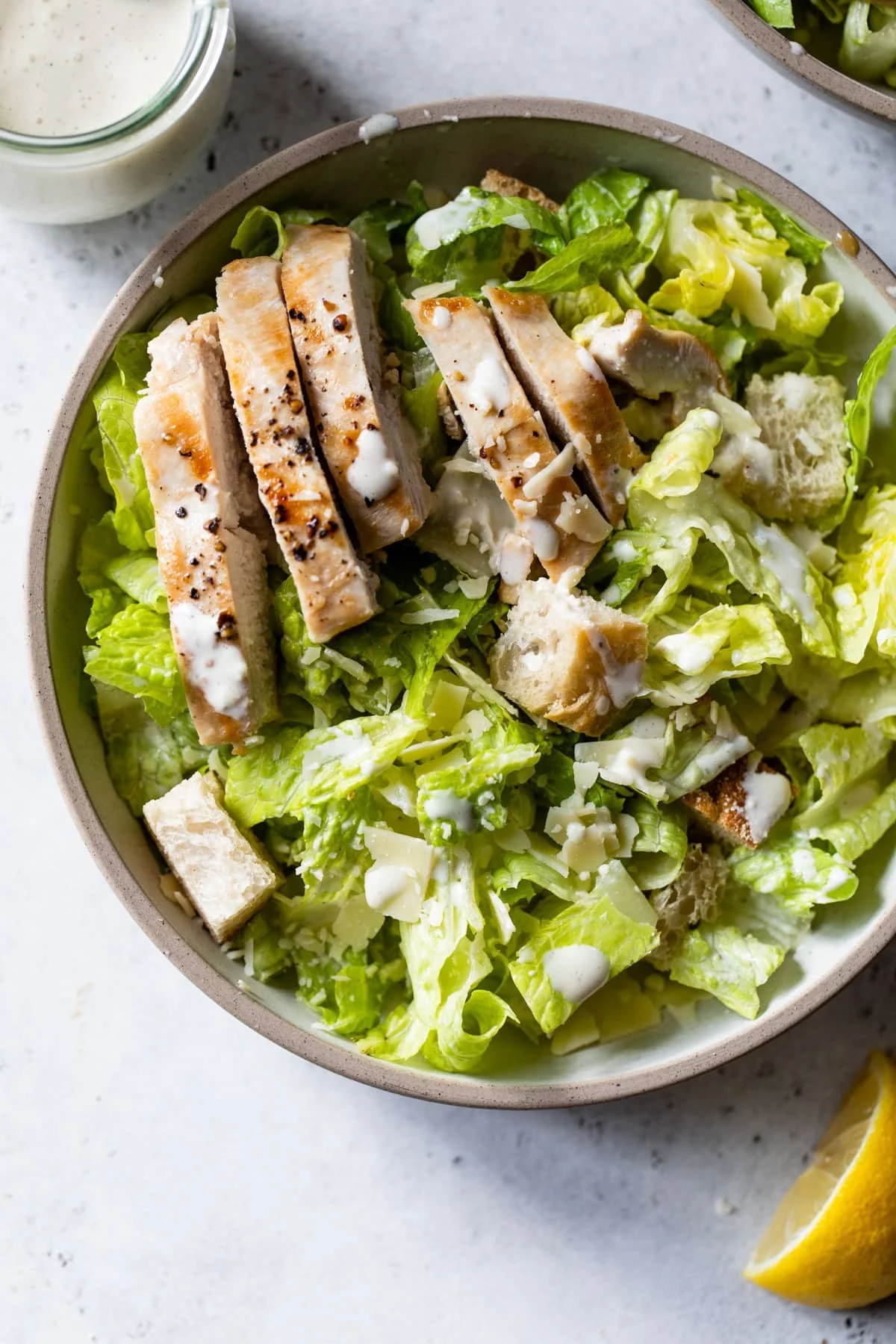 Grilled chicken Caesar salad in a bowl
