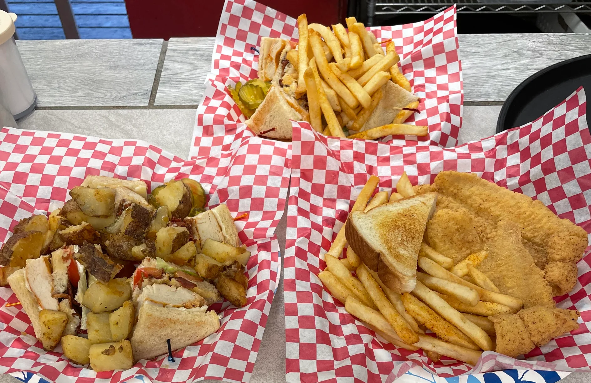 Southern fried catfish with fries and sandwiches