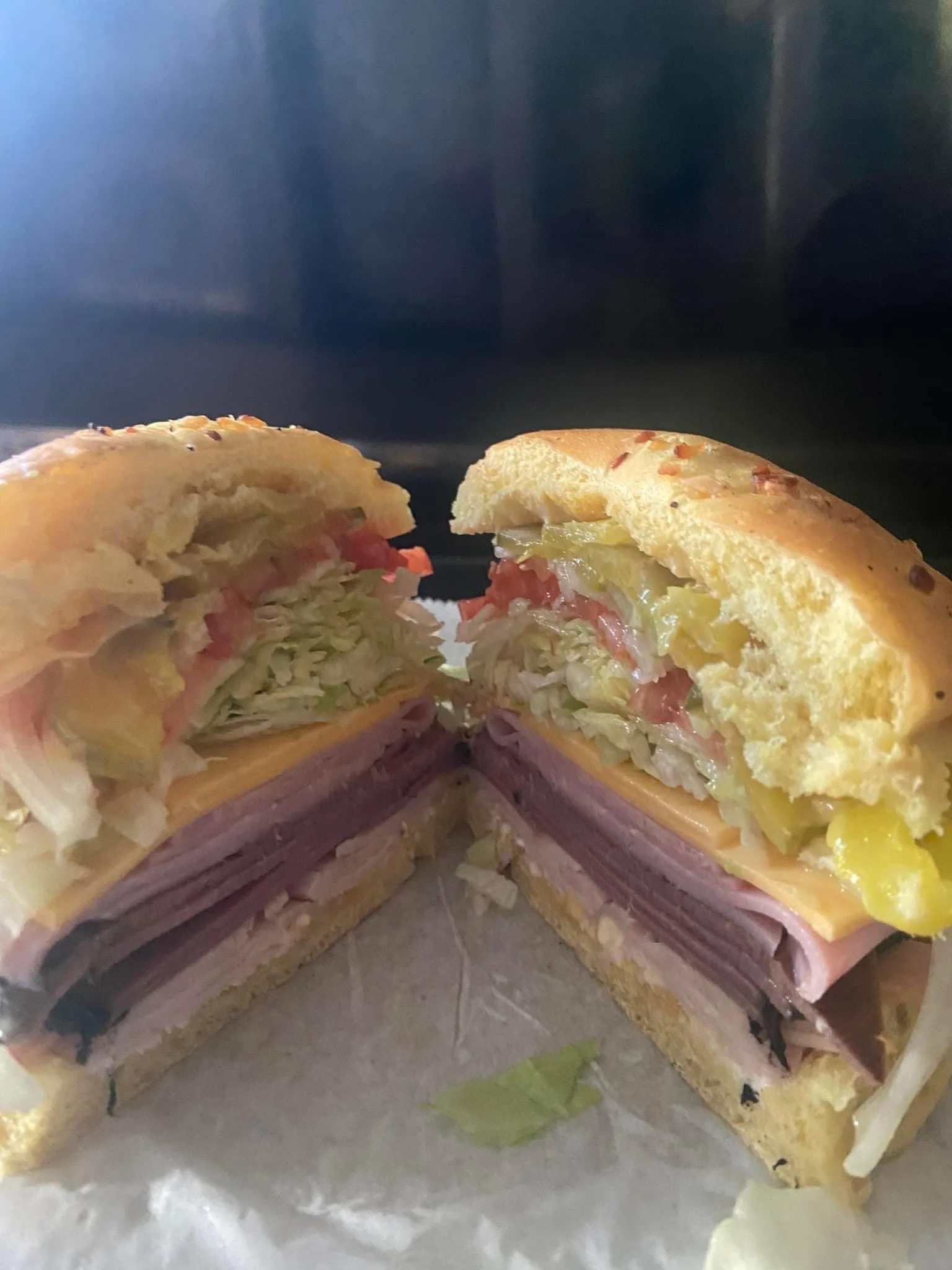 Classic Italian sub sandwich with layers of meats and fresh vegetables