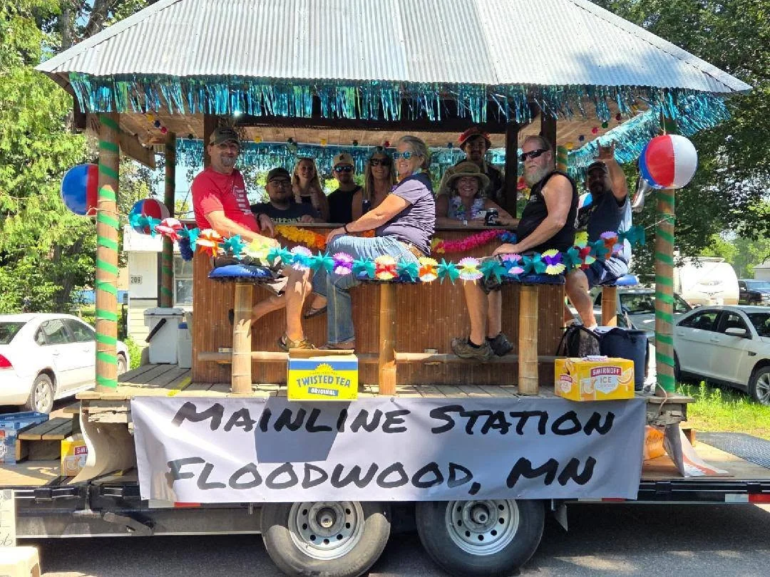 Festive float with friends at a summer parade in Floodwood, MN