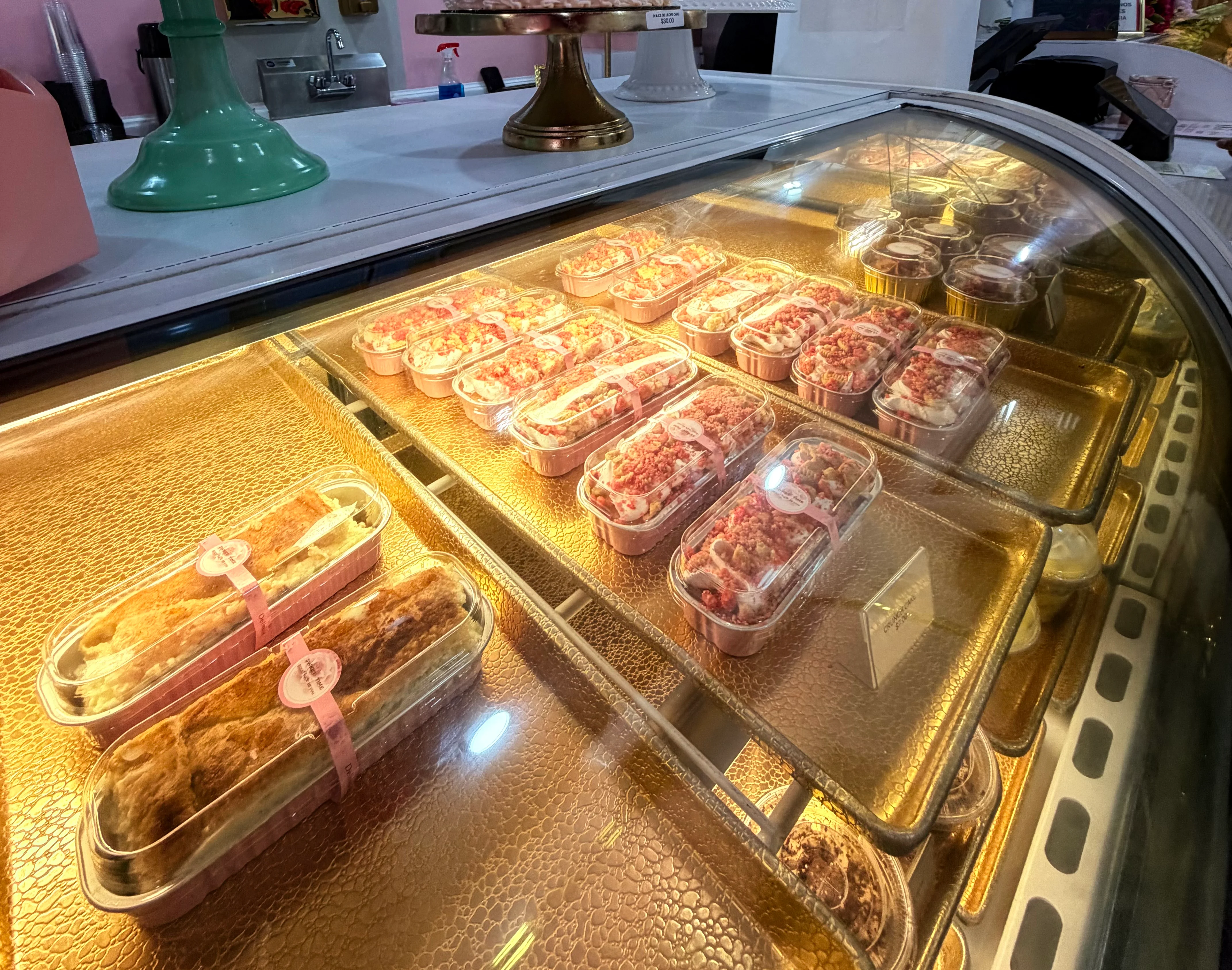 Colorful display of desserts in a bakery showcasing cakes and sweet treats
