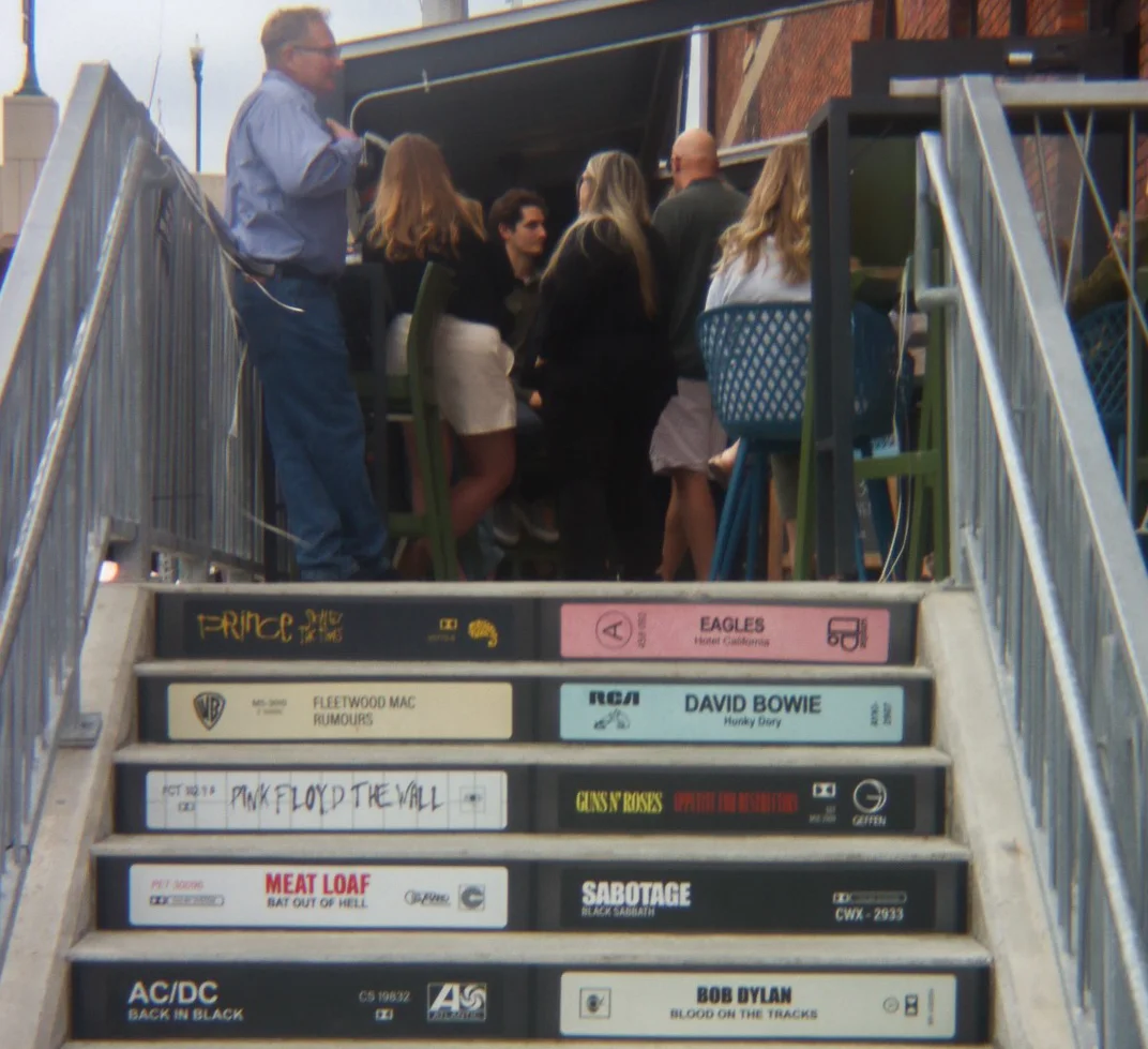 stairs leading up to the vinyl door