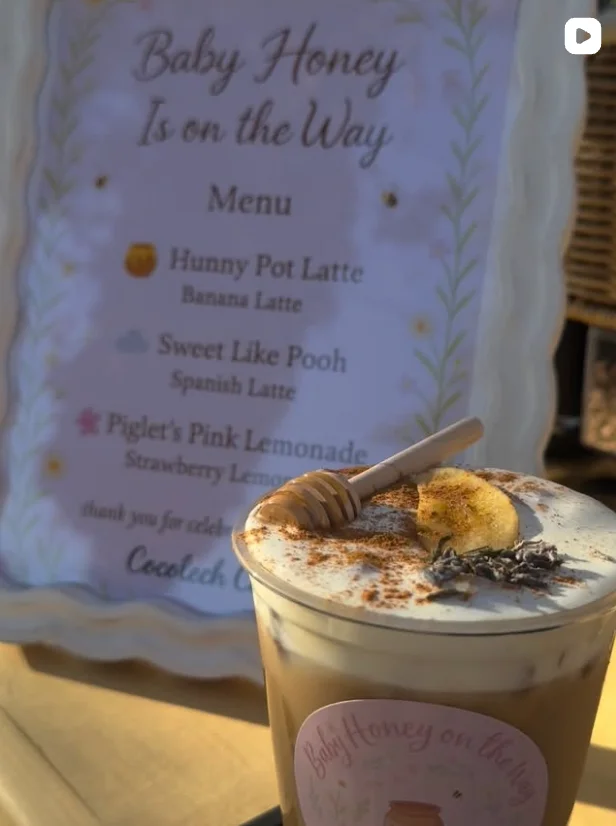 Iced Spanish latte with honey and banana garnish