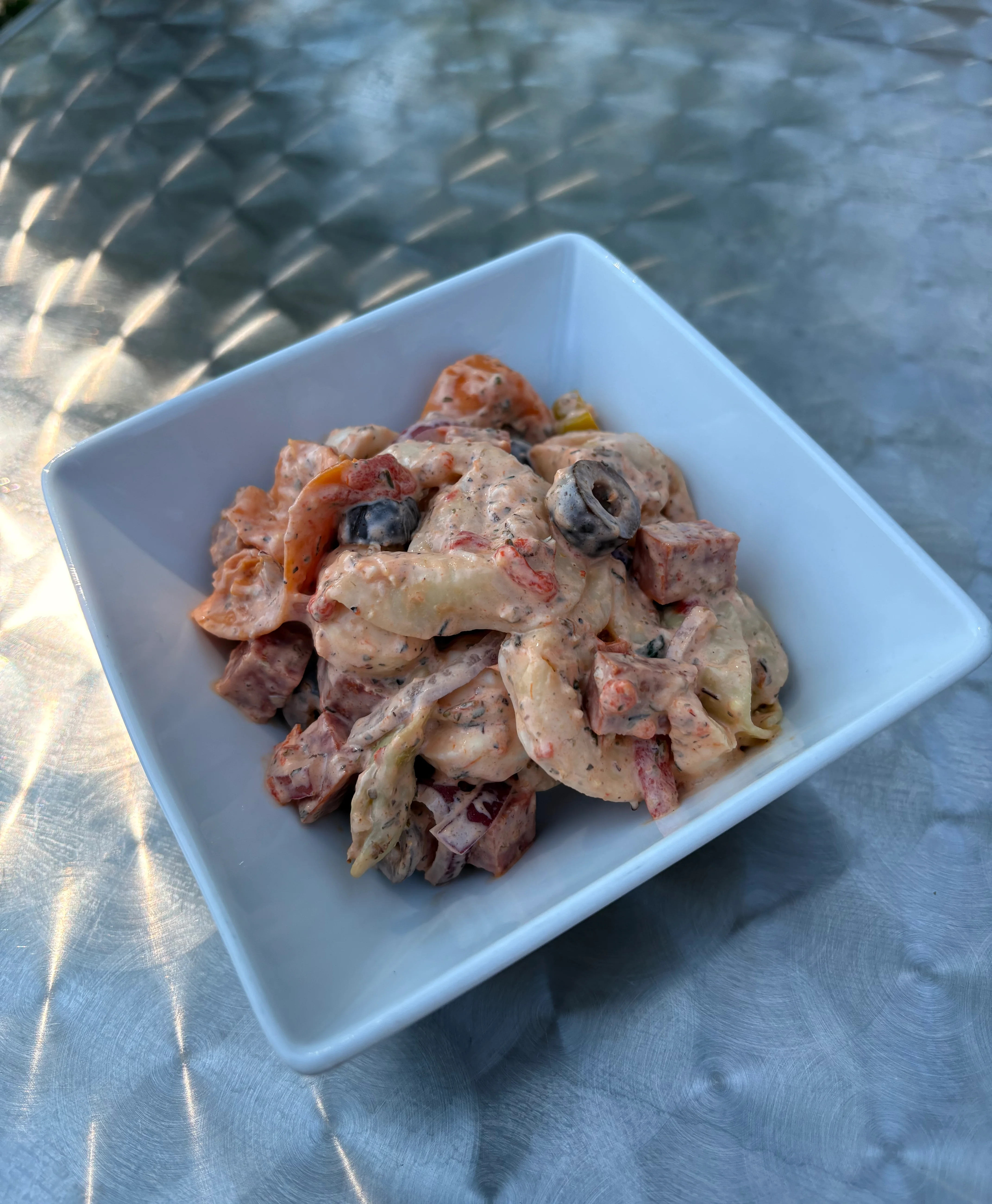 Italian pasta salad with olives and vegetables