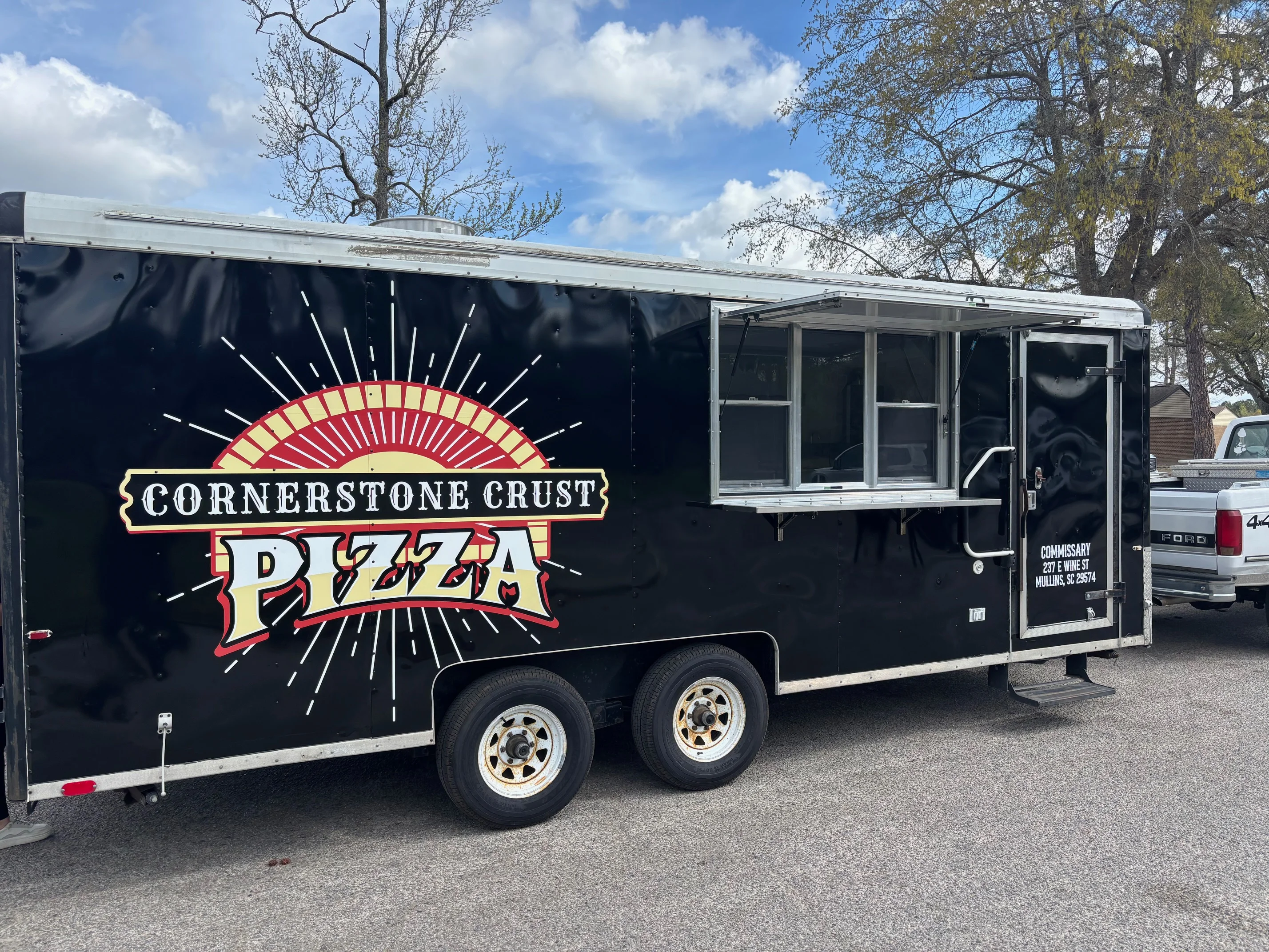 Mobile pizza food truck with vibrant branding