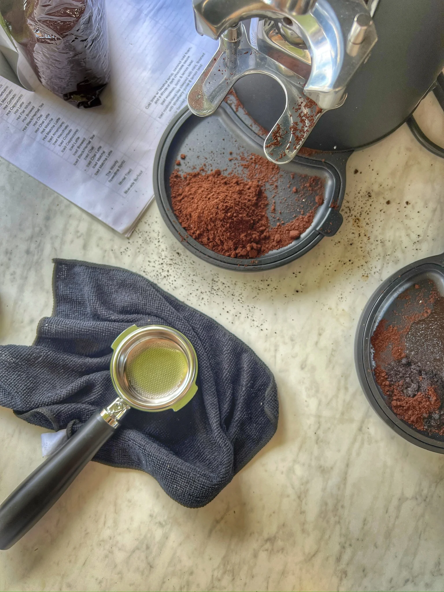 Coffee preparation setup with ground coffee and portafilter