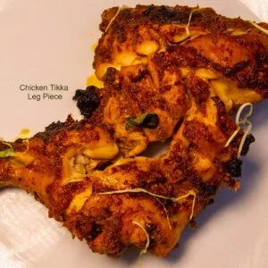 Grilled Chicken Tikka leg piece, a popular Indian dish