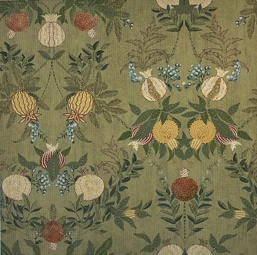 Intricate floral textile pattern with pomegranates and leaves