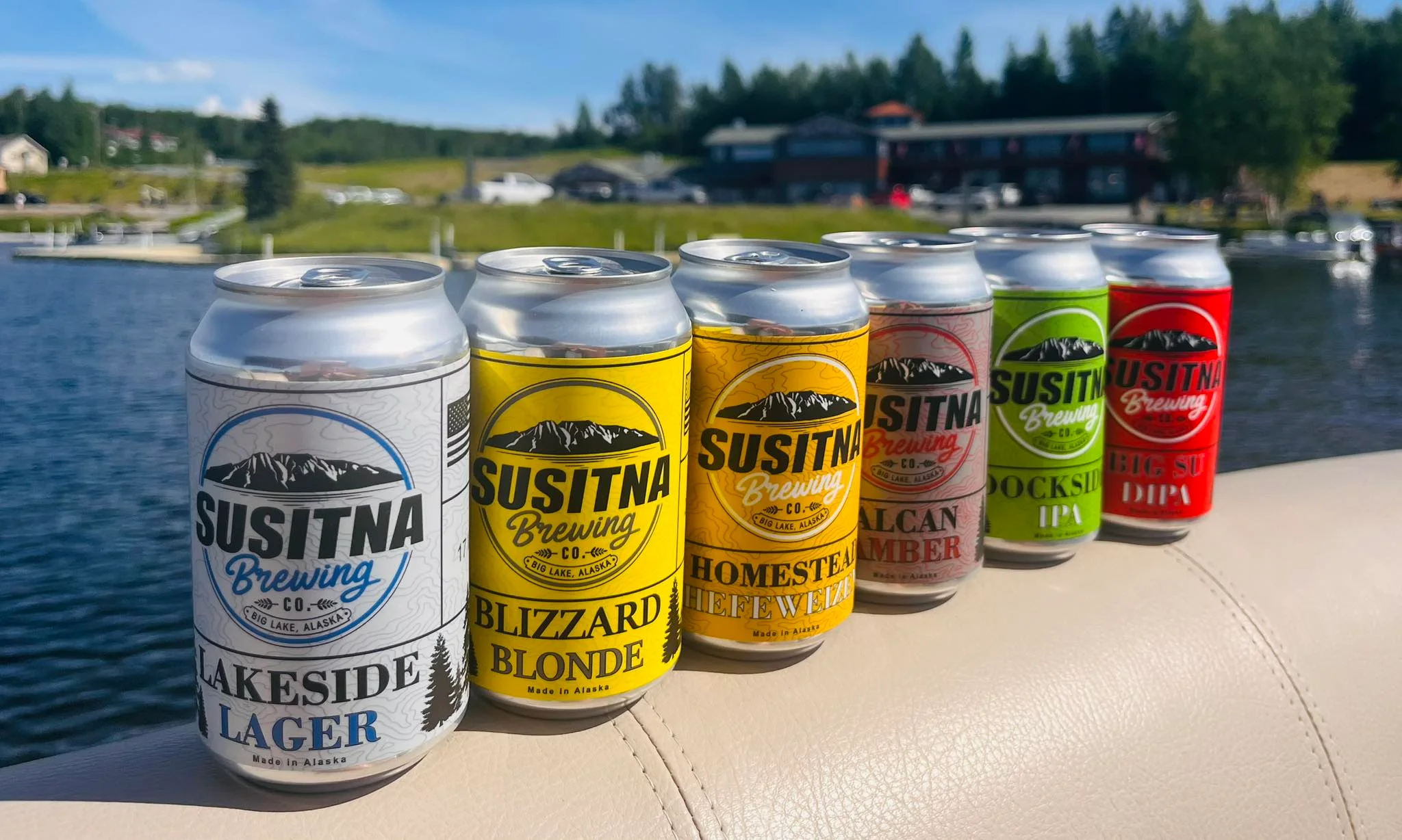 Variety of Susitna Brewing craft beers by the lake