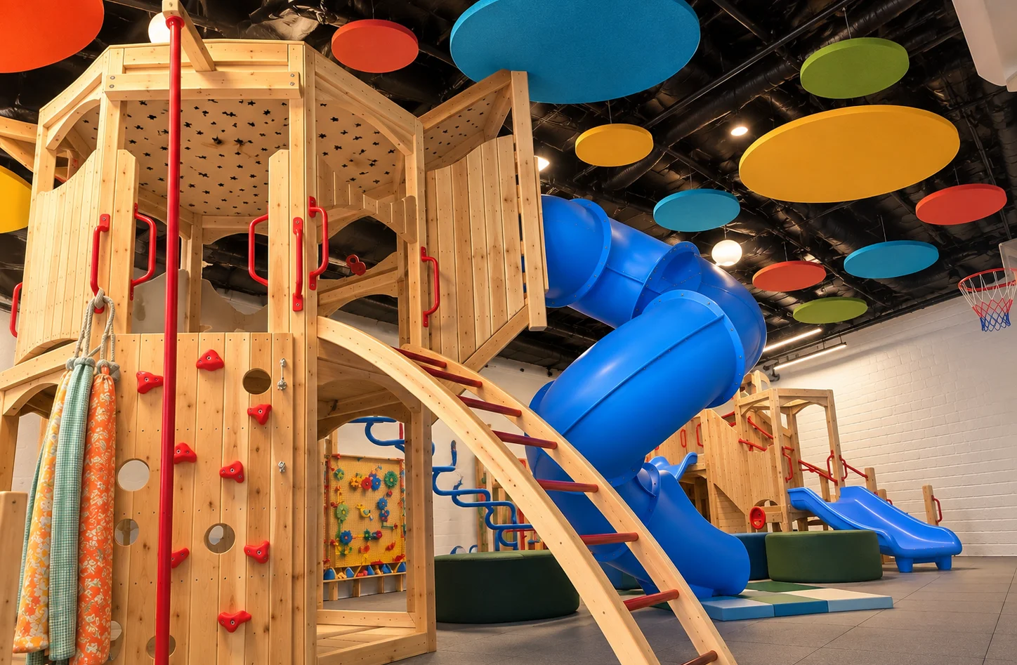 Child playing in a ball pit with colorful balls and a painted face