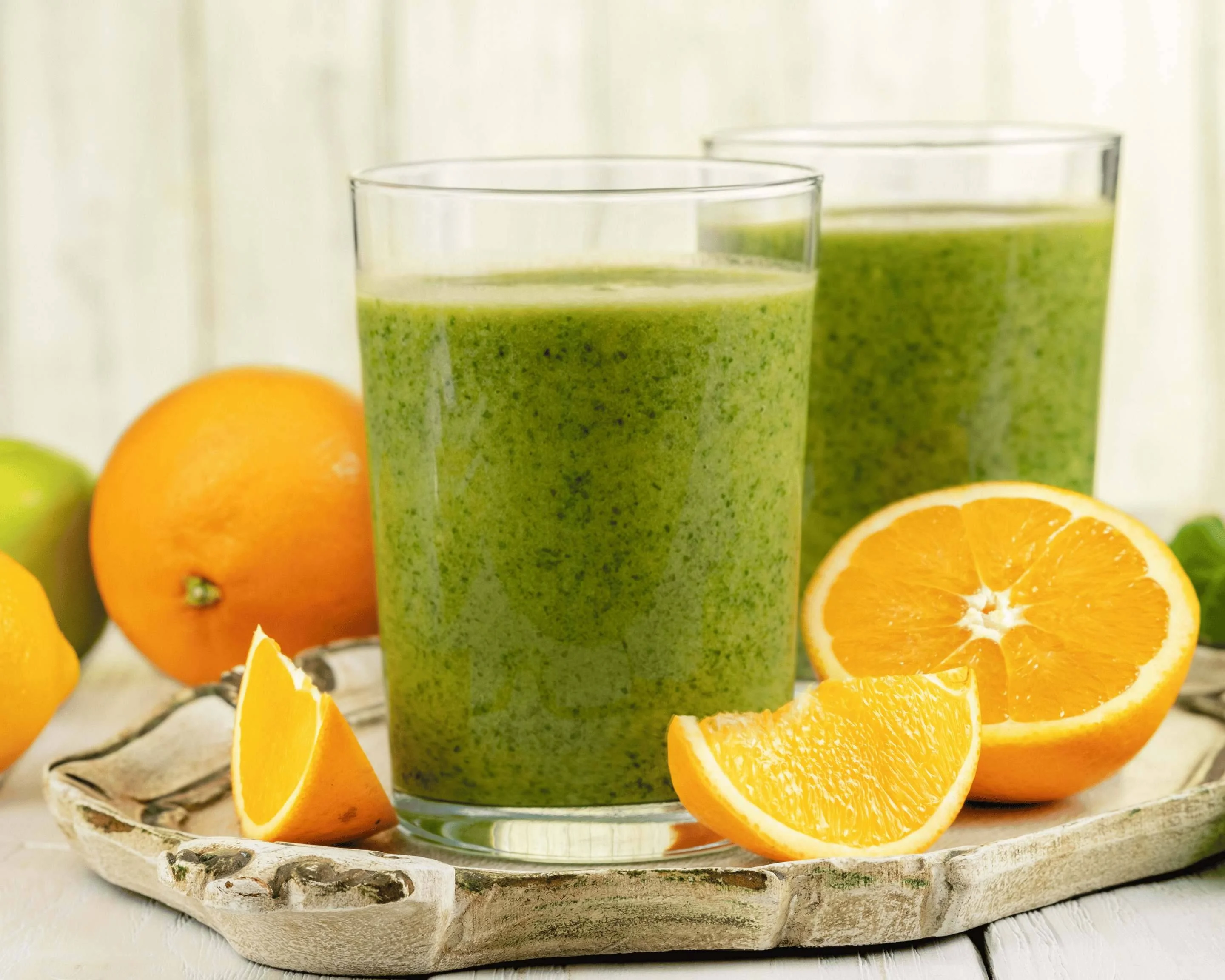 Refreshing green smoothie with citrus fruits
