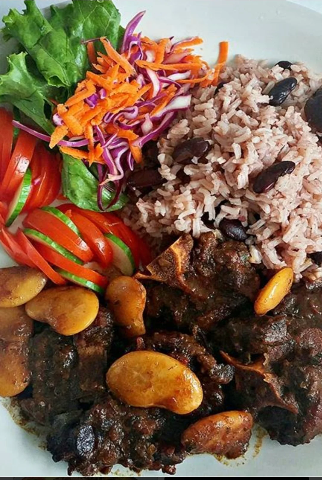 Jamaican oxtail stew with rice and peas