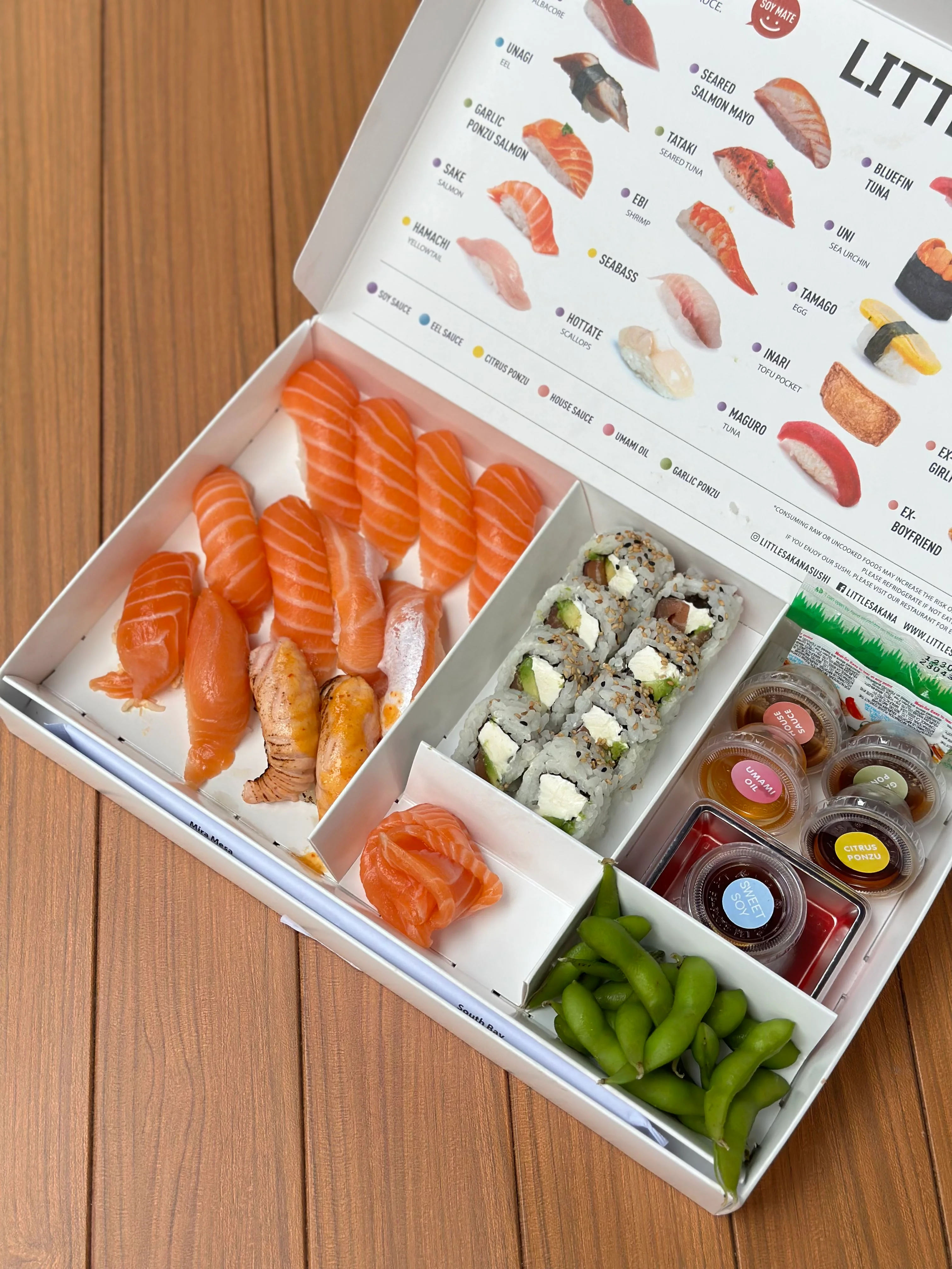 Assorted sushi platter featuring nigiri and rolls