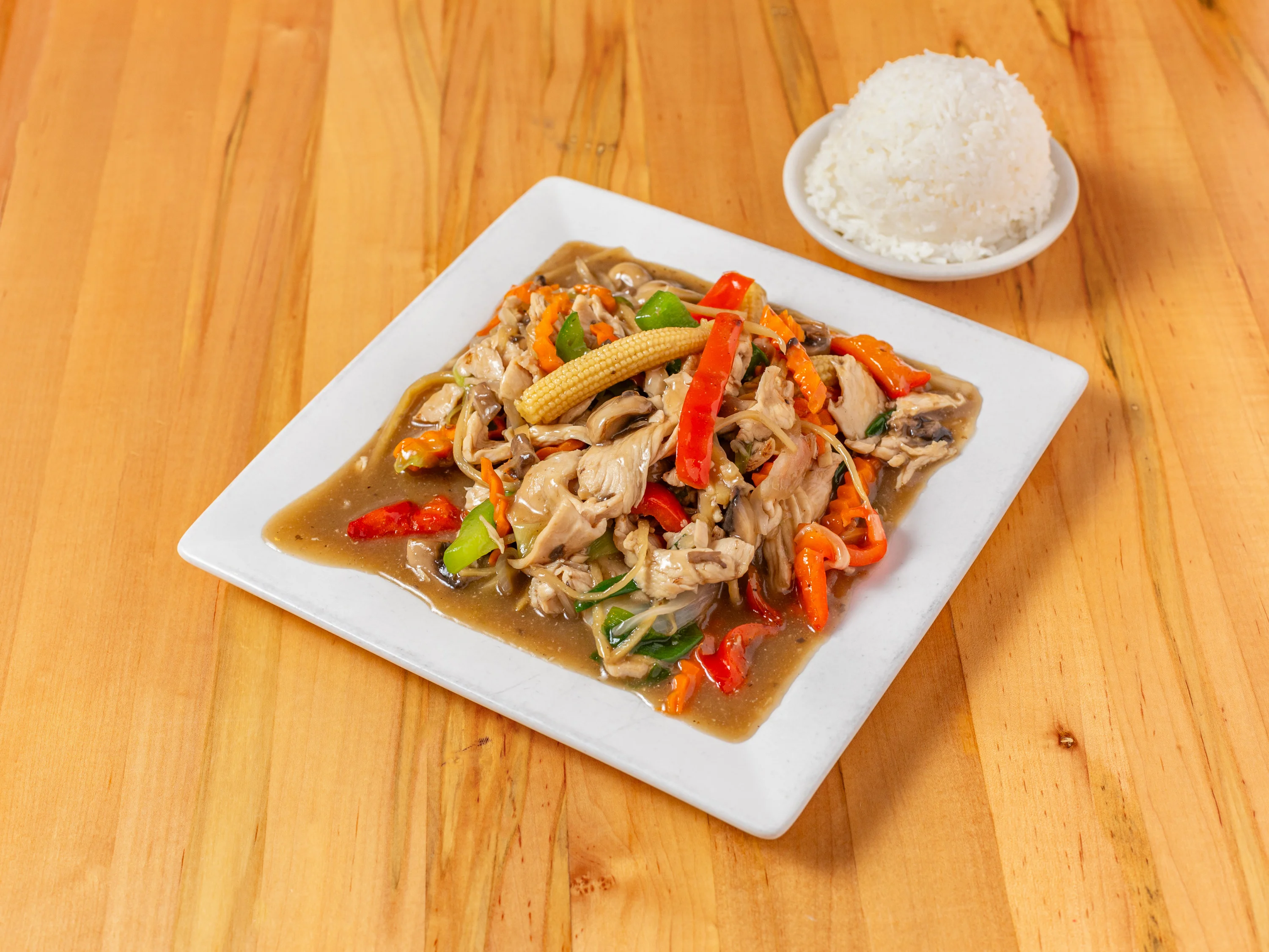 Thai chicken stir-fry with vegetables and rice