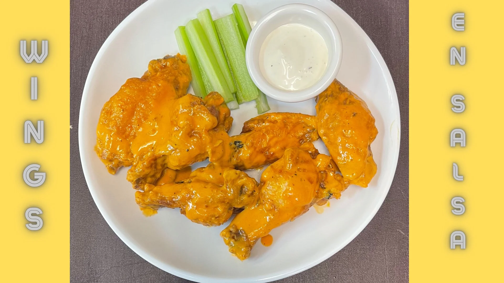 Buffalo chicken wings with celery and ranch dressing