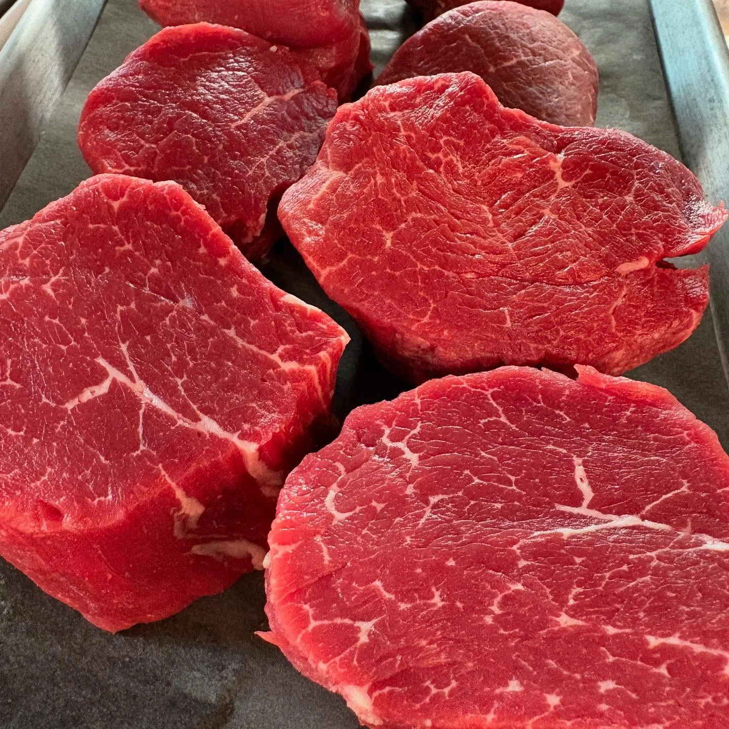 Fresh cuts of beef for grilling or steak preparation