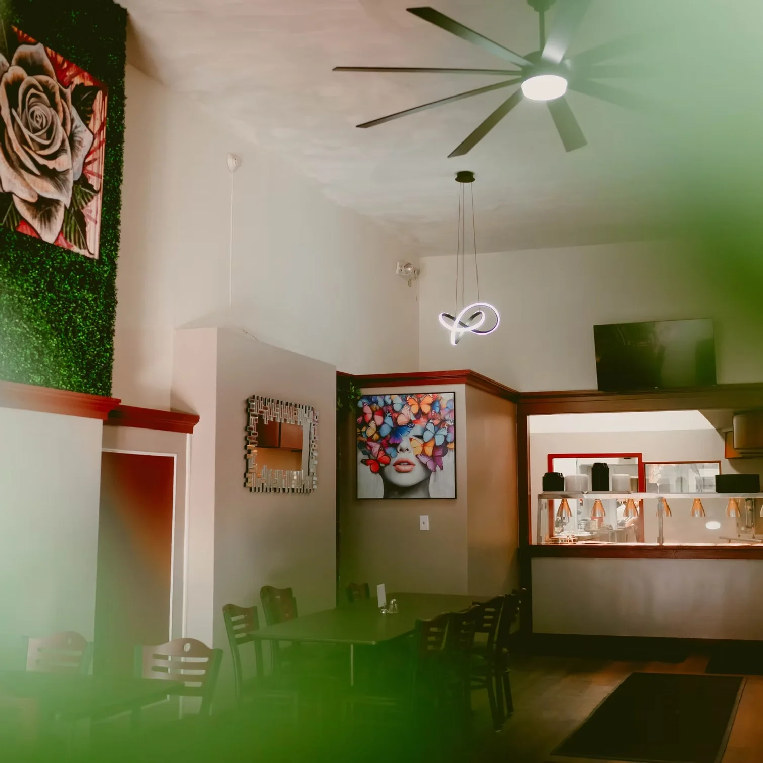 Stylish restaurant interior with modern decor and vibrant wall art