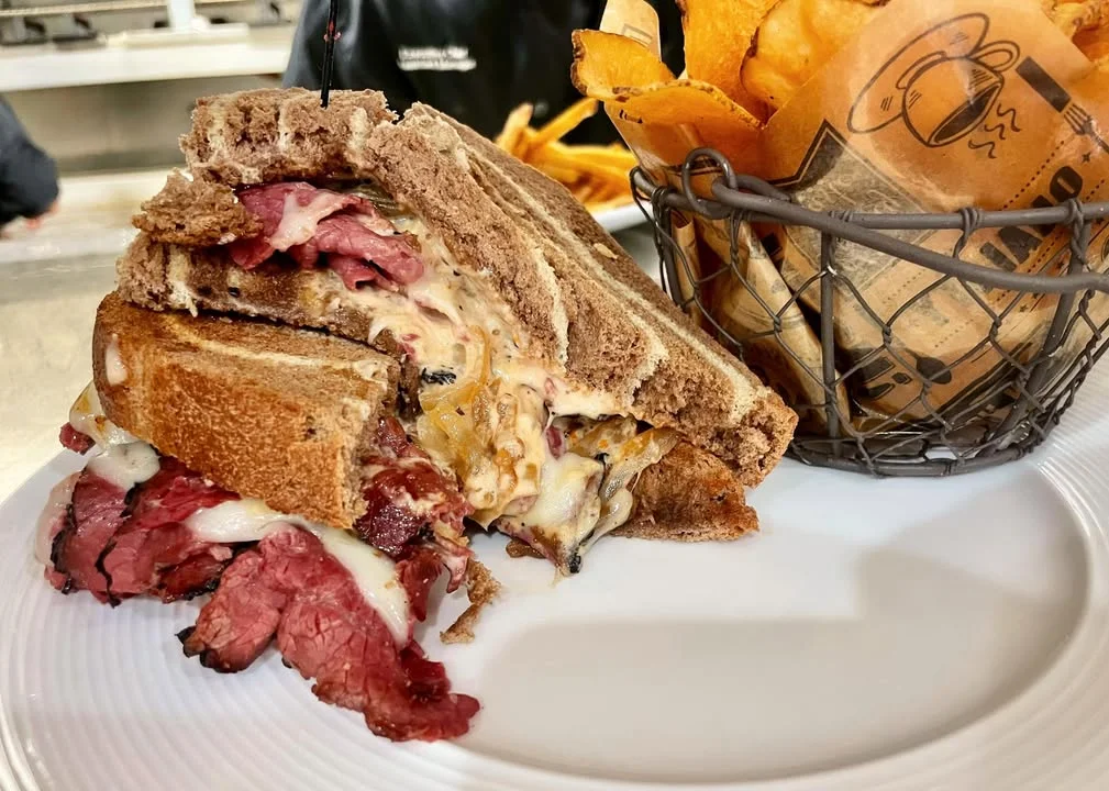 Classic Reuben sandwich with pastrami and melted cheese