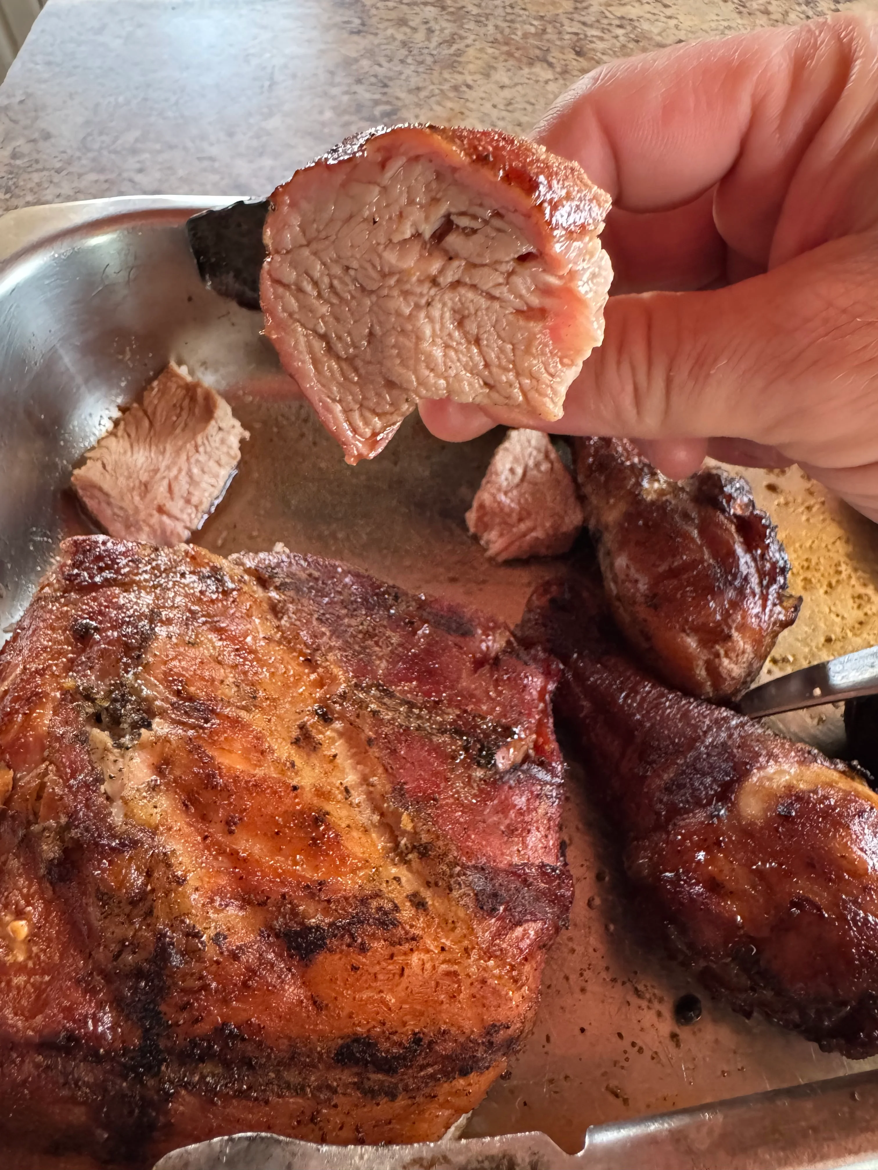 Smoked brisket slice showcasing juicy texture