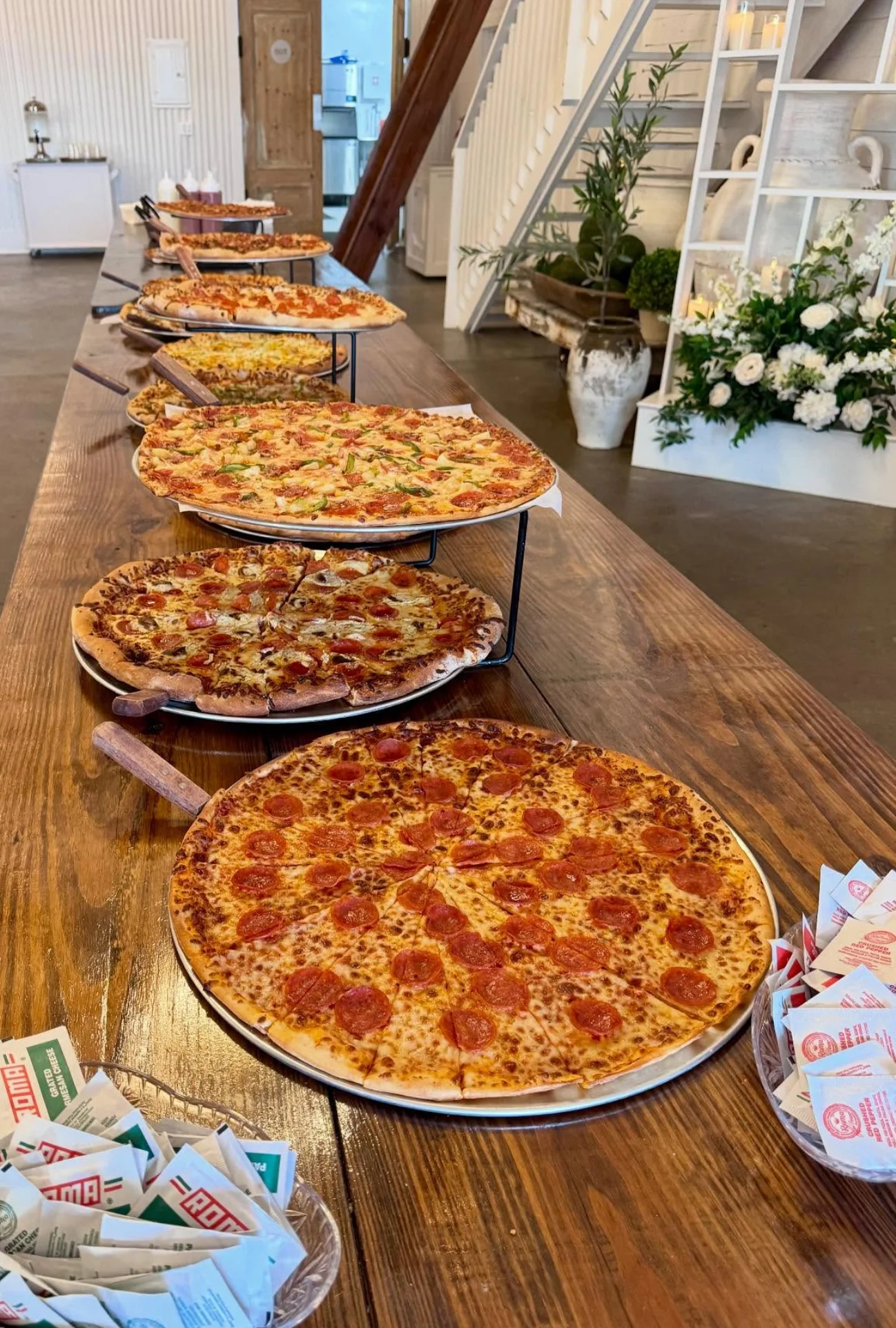 New York-style pizza buffet with assorted pizzas in a restaurant