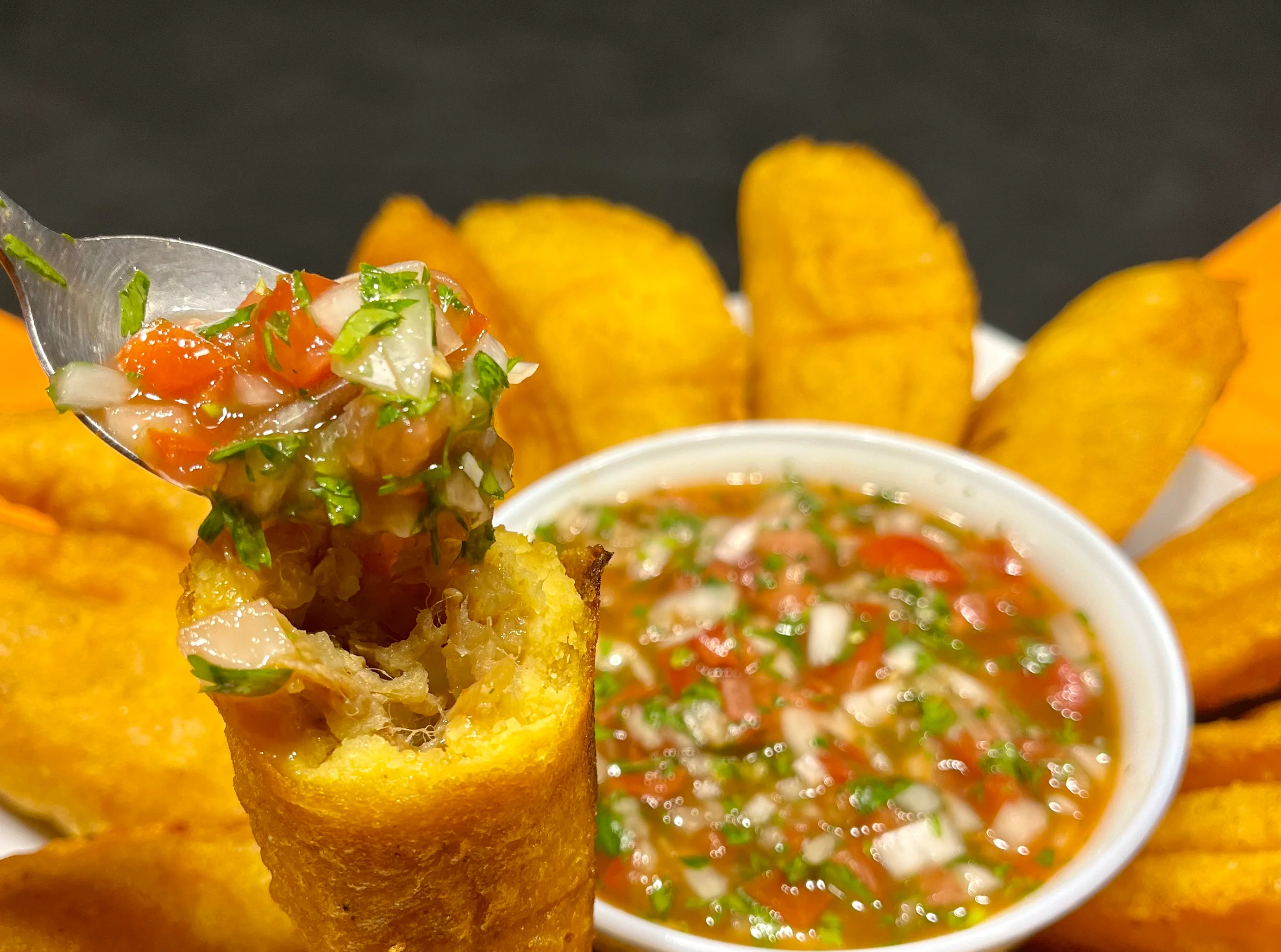 Crispy Colombian arepas with fresh salsa