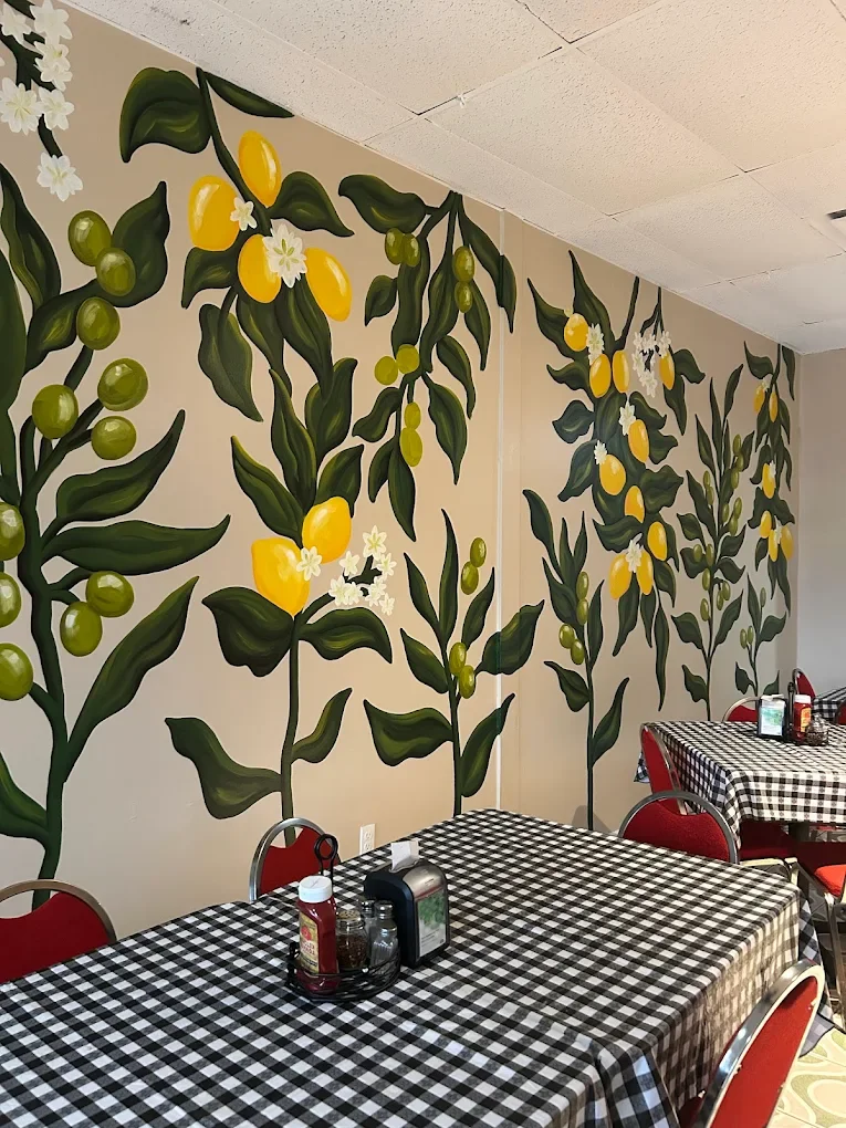 Charming restaurant interior with vibrant fruit mural