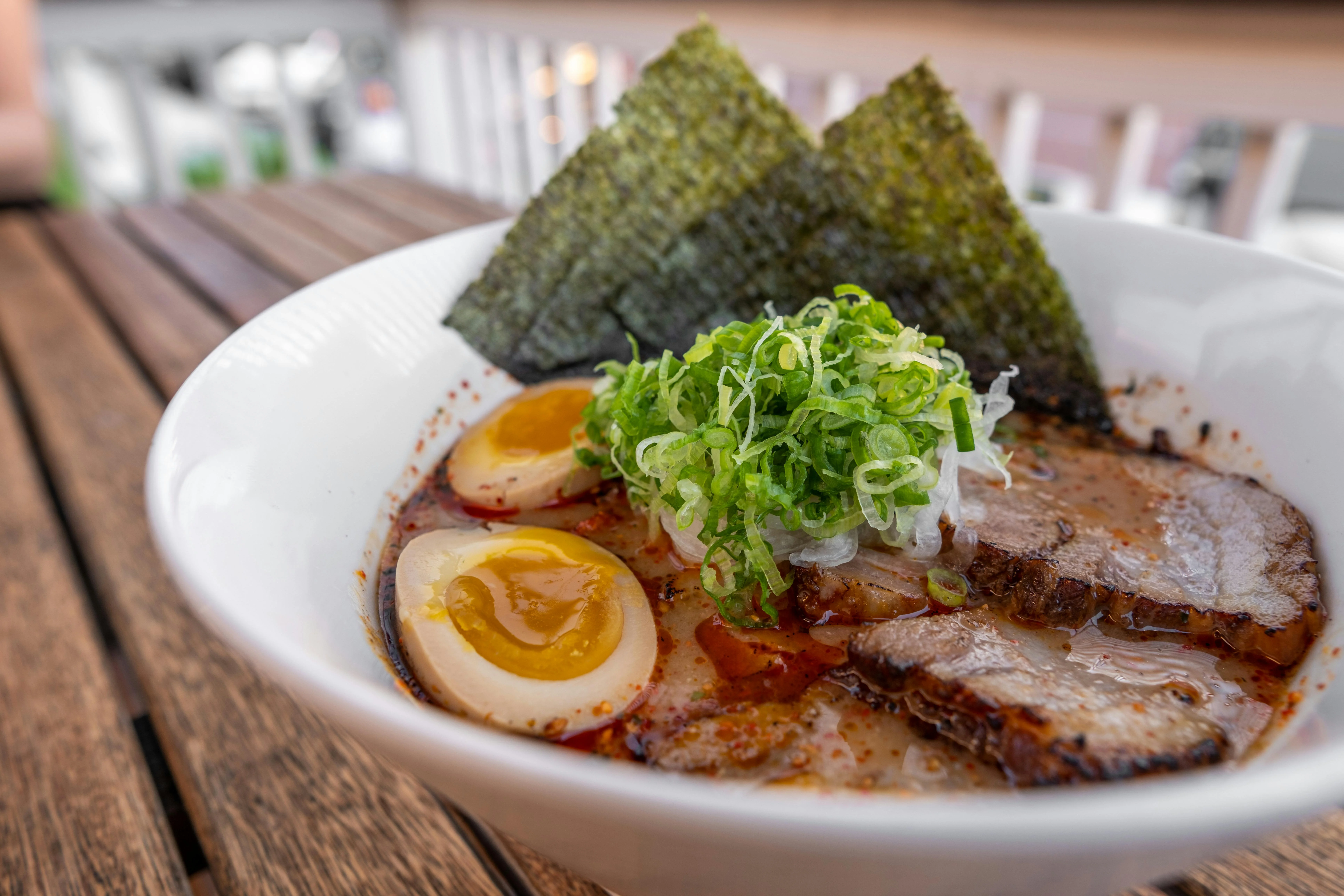 Japanese tonkotsu ramen with soft-boiled eggs and nori