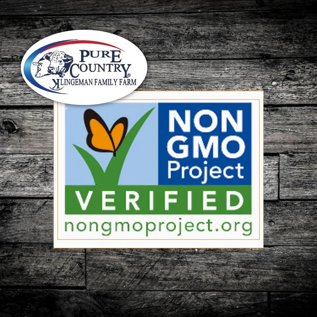 A logo featuring a cow and the text 'Pure Country Klingeman Family Farm'. The design includes red and blue elements.
