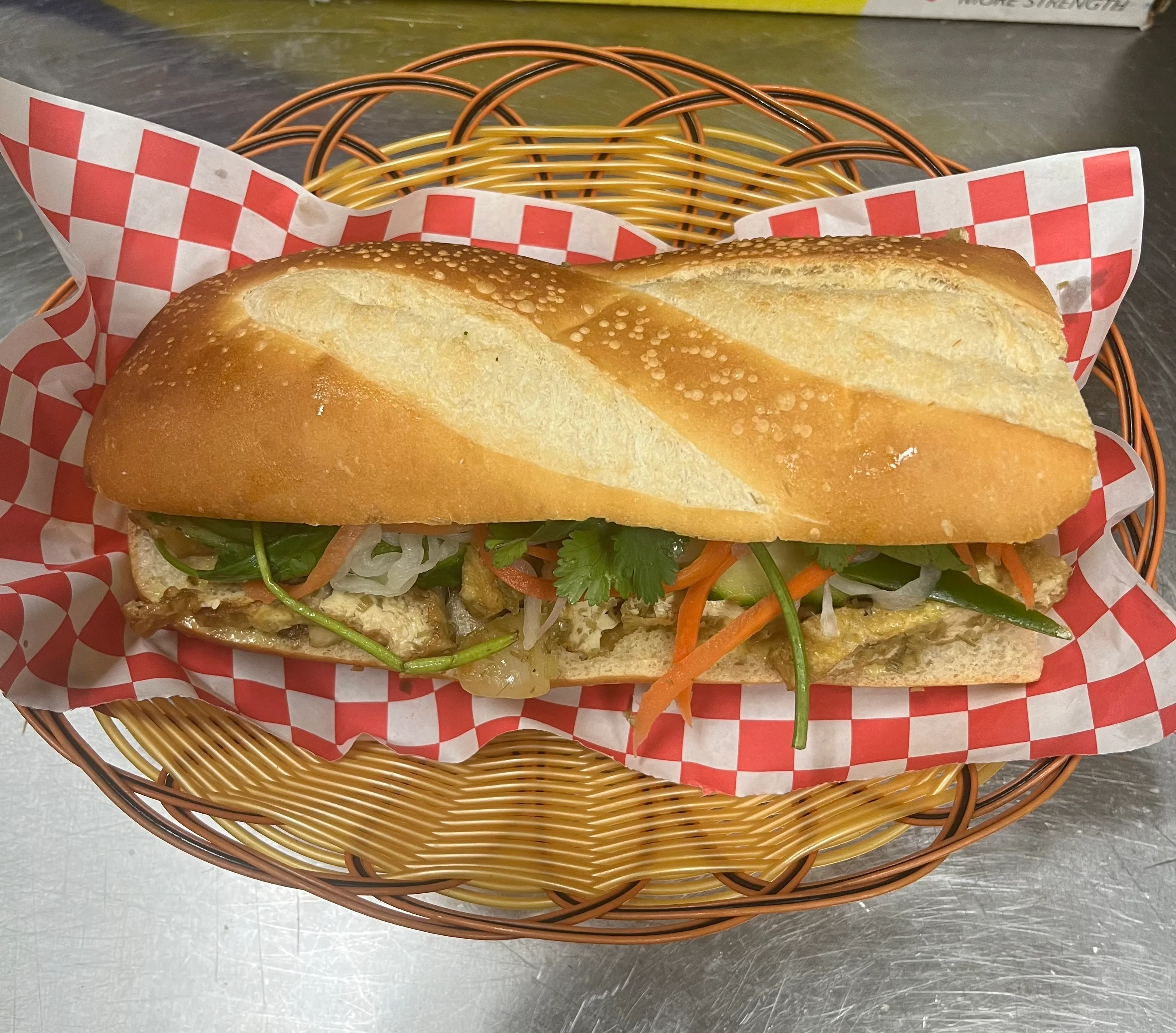 Vietnamese banh mi sandwich with fresh vegetables