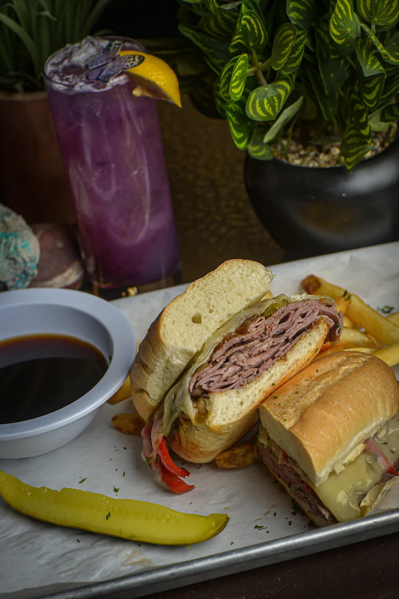Italian beef sandwich with au jus and pickles
