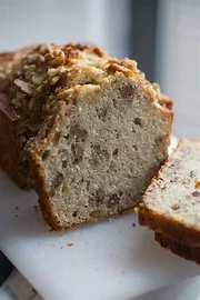 Sliced banana bread with a crunchy topping
