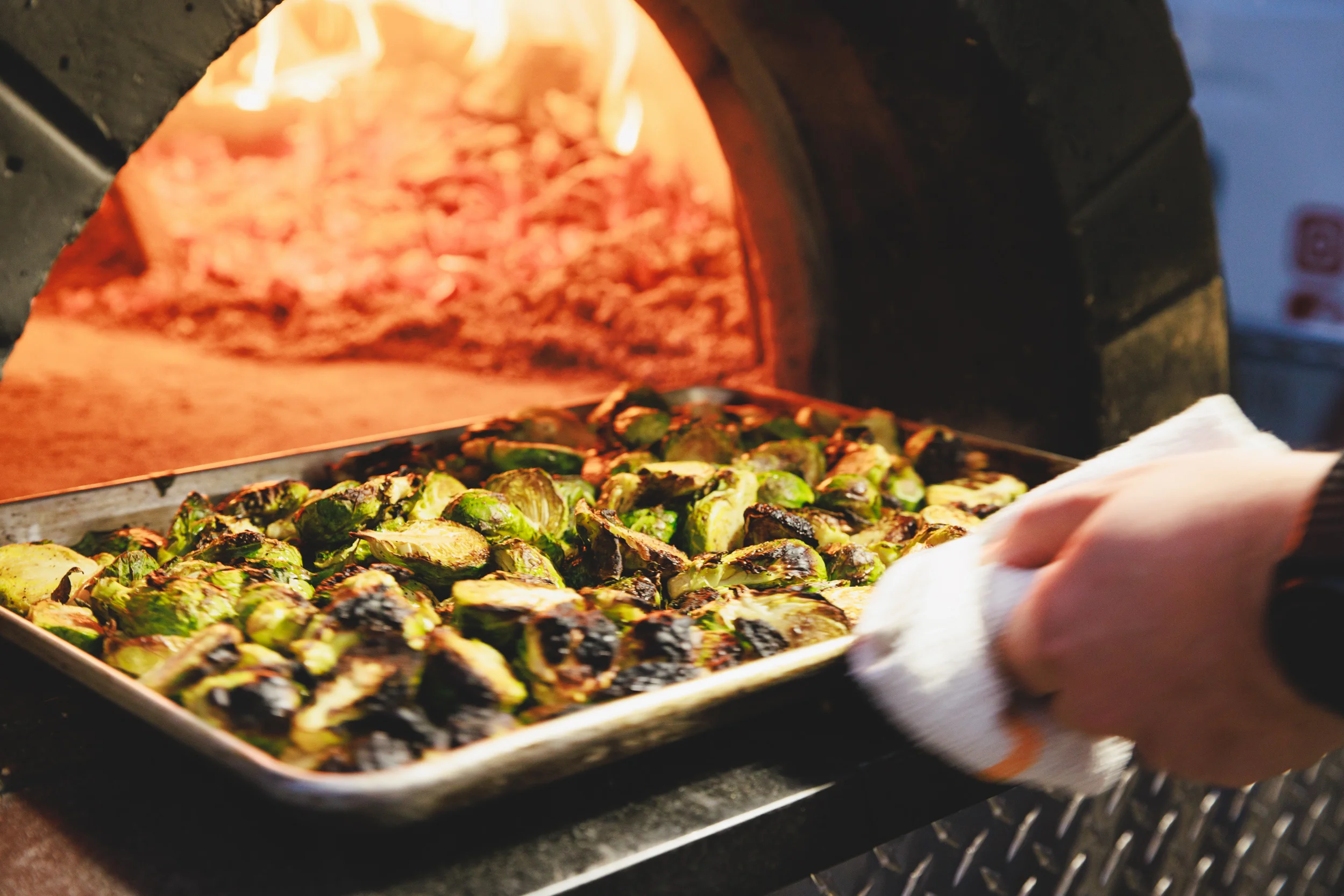 Roasted Brussels sprouts from a wood-fired oven
