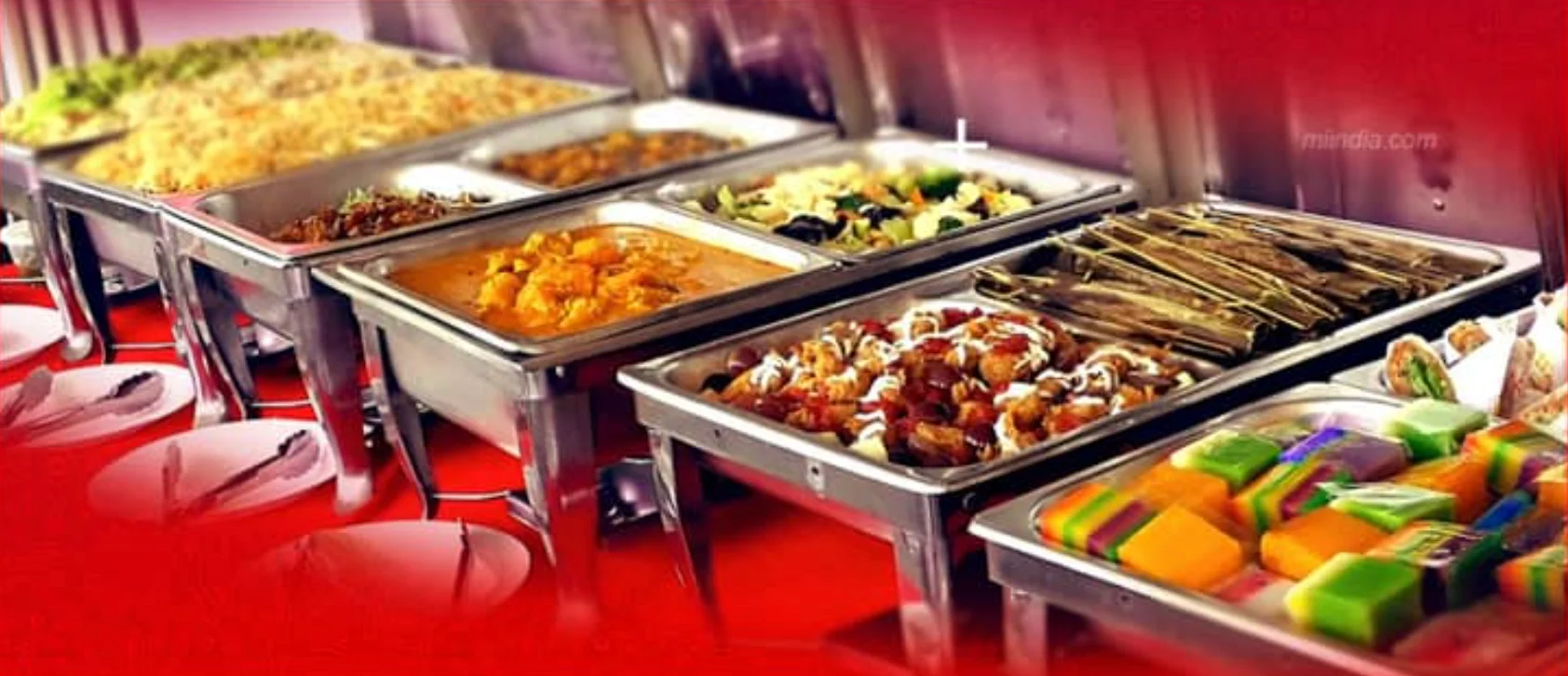 Buffet spread featuring Asian-inspired dishes and colorful desserts