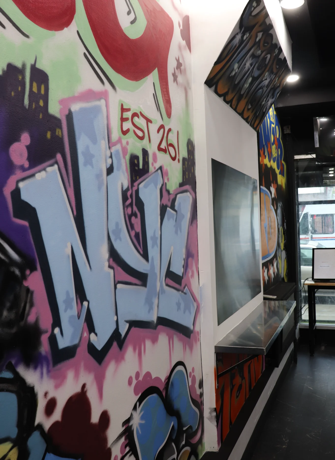 Vibrant graffiti art in a modern restaurant interior