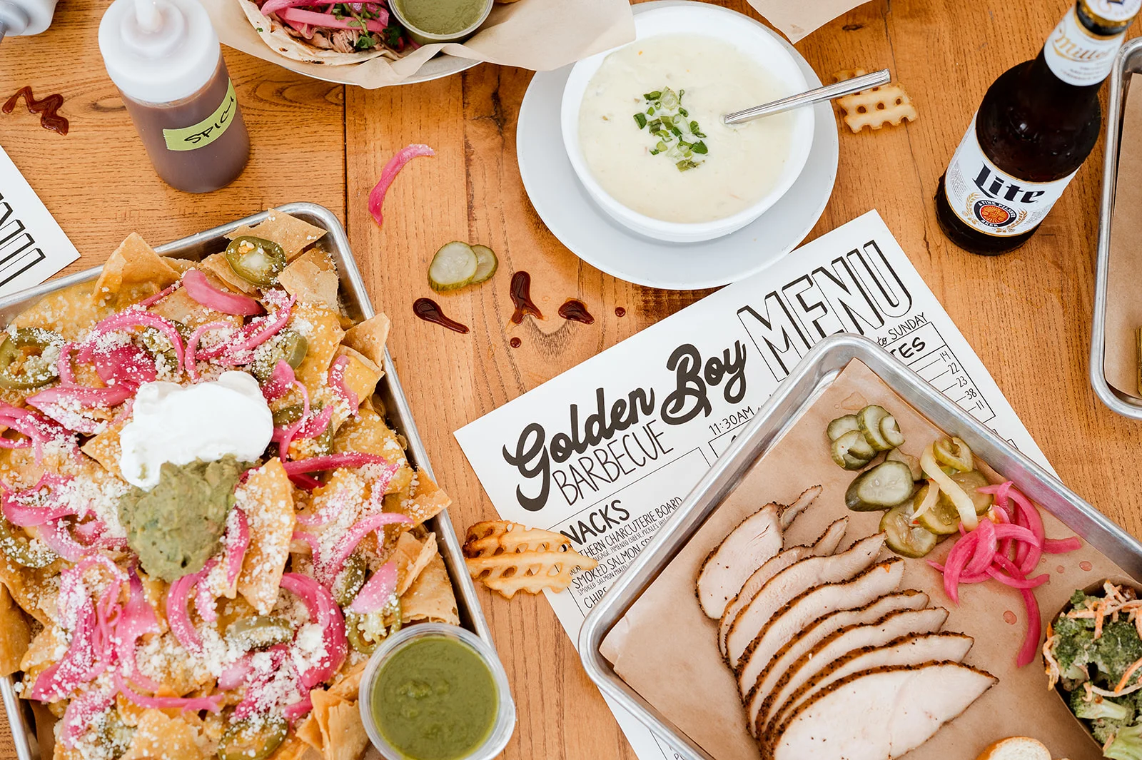 Loaded nachos with guacamole and pickled onions, a popular Mexican dish