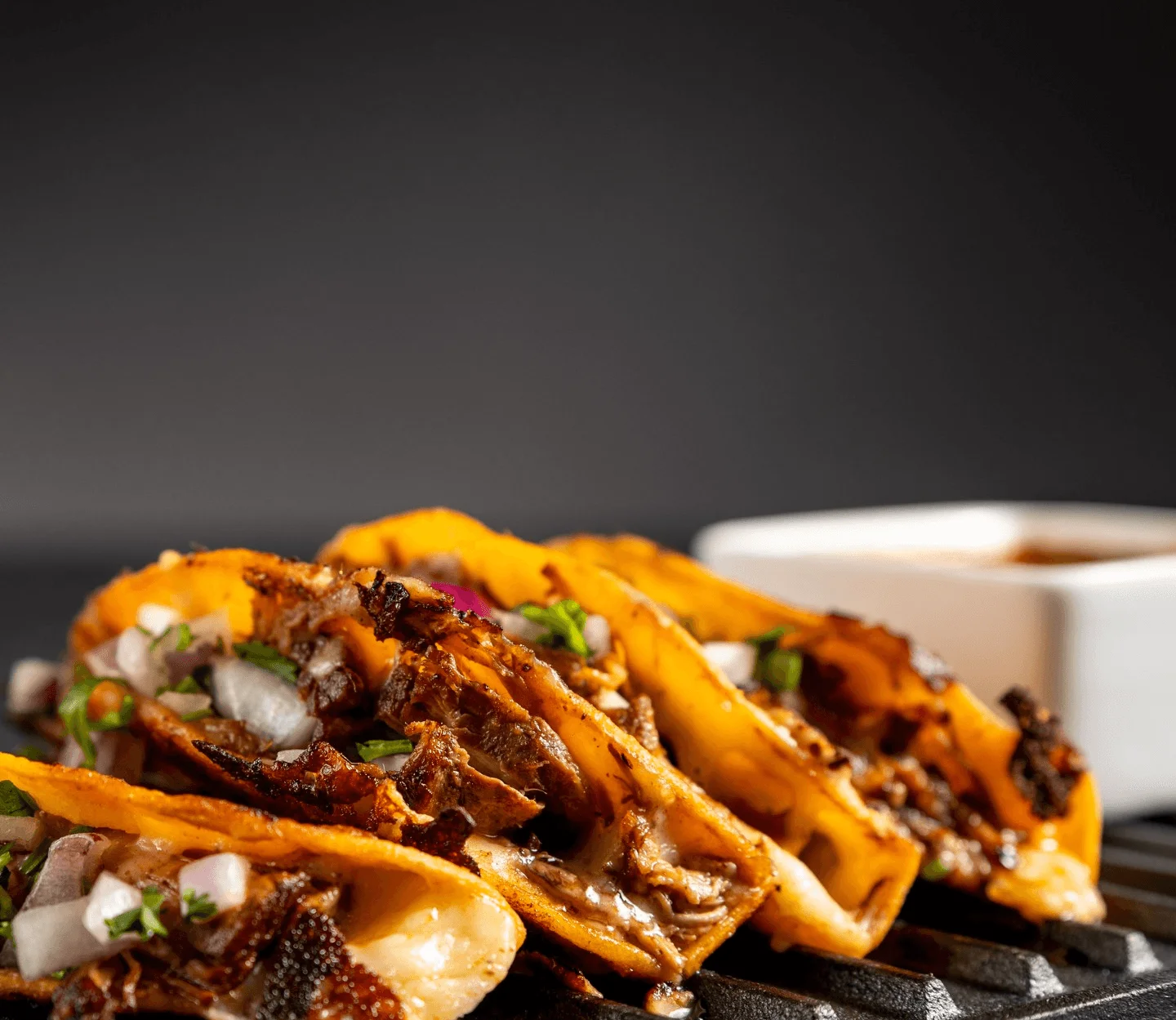 Delicious Mexican tacos al pastor with onions and cilantro