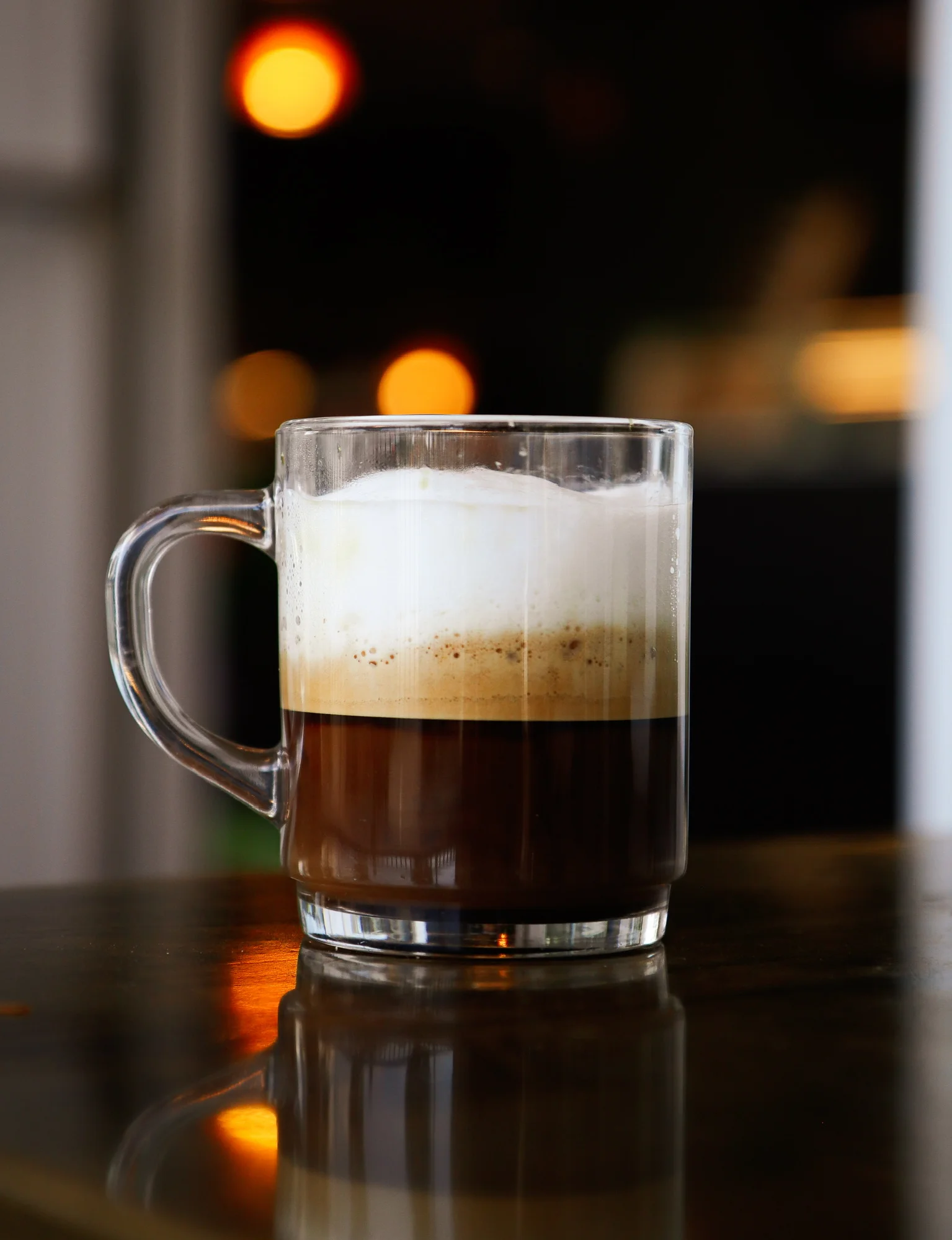 Rich espresso coffee topped with creamy froth