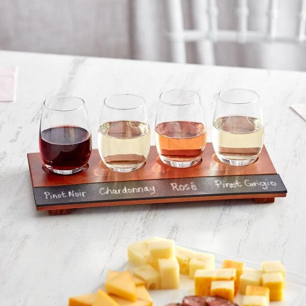 Wine tasting flight with assorted wines and cheese platter