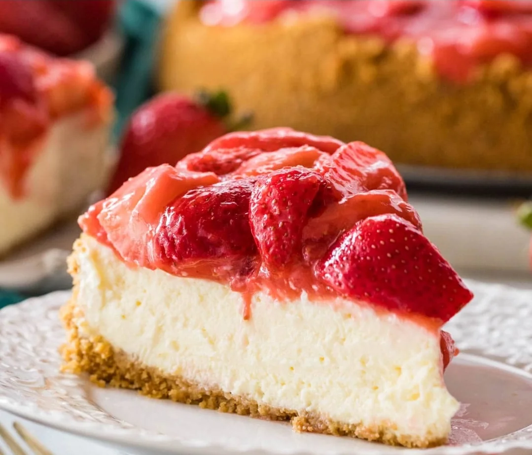 Strawberry cheesecake slice with glossy topping