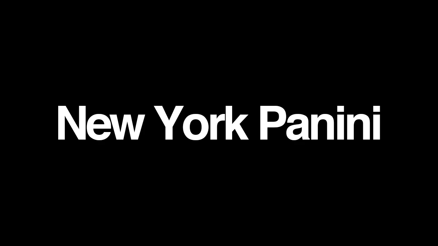 New York-style panini sandwich on a black background