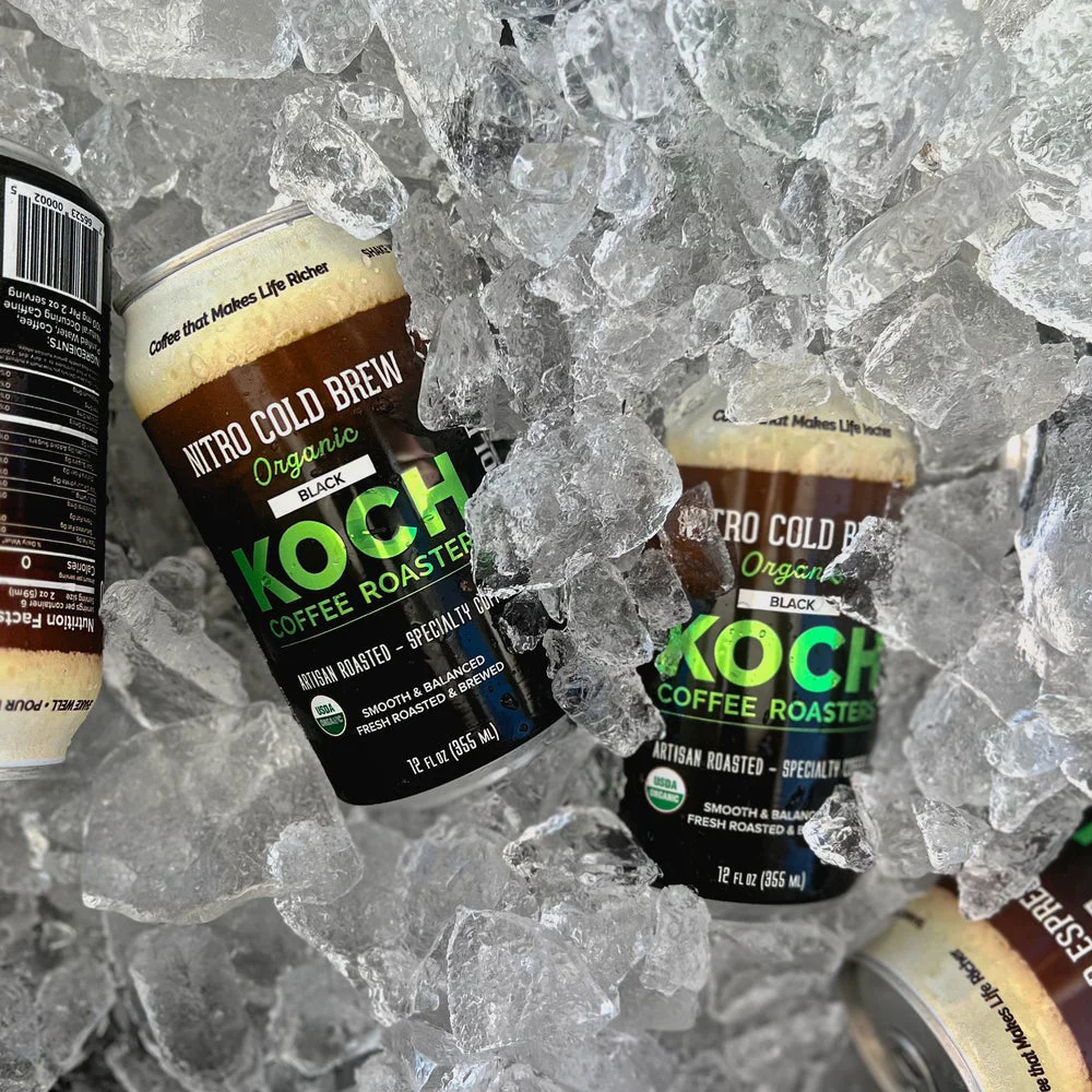 Chilled nitro cold brew coffee cans on ice