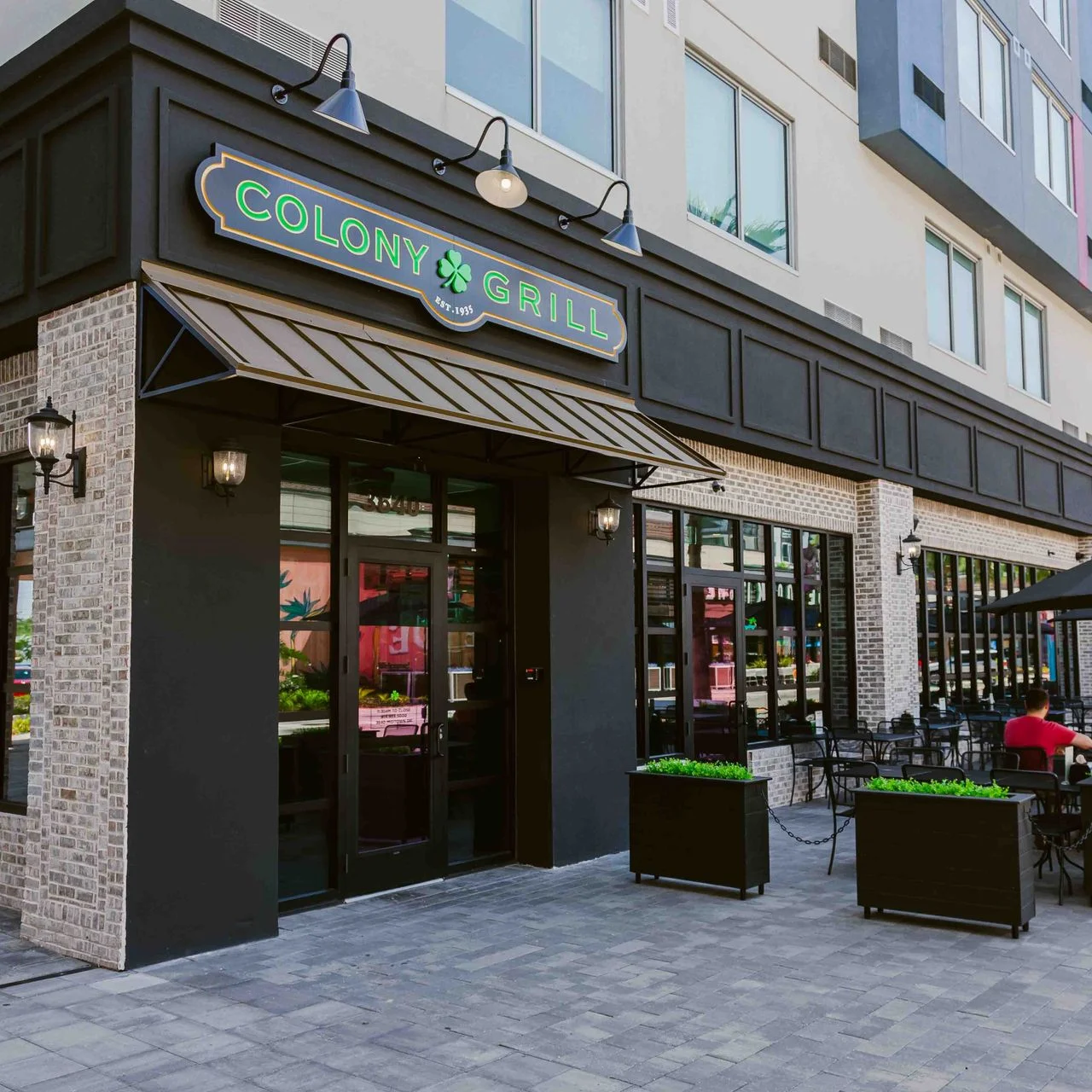 Exterior view of Colony Grill restaurant with modern design