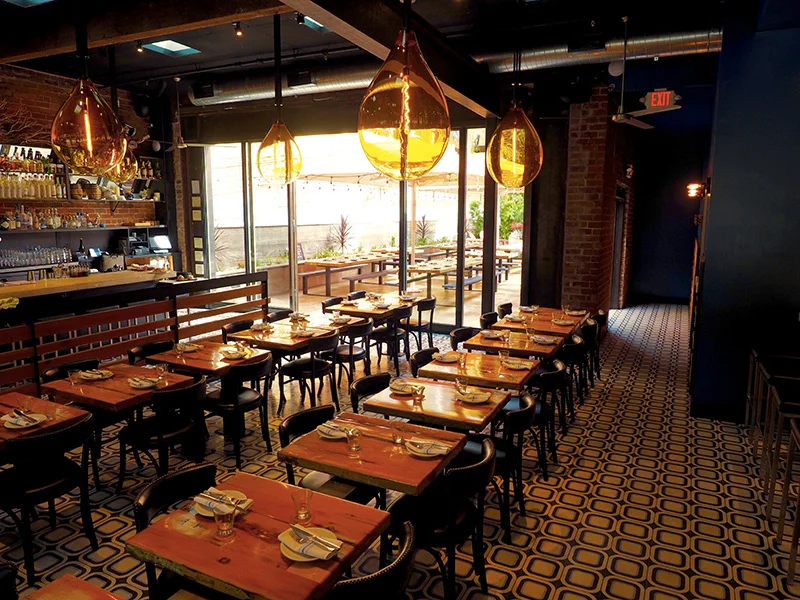 indoor shot of tables set at Playa Mill Valley