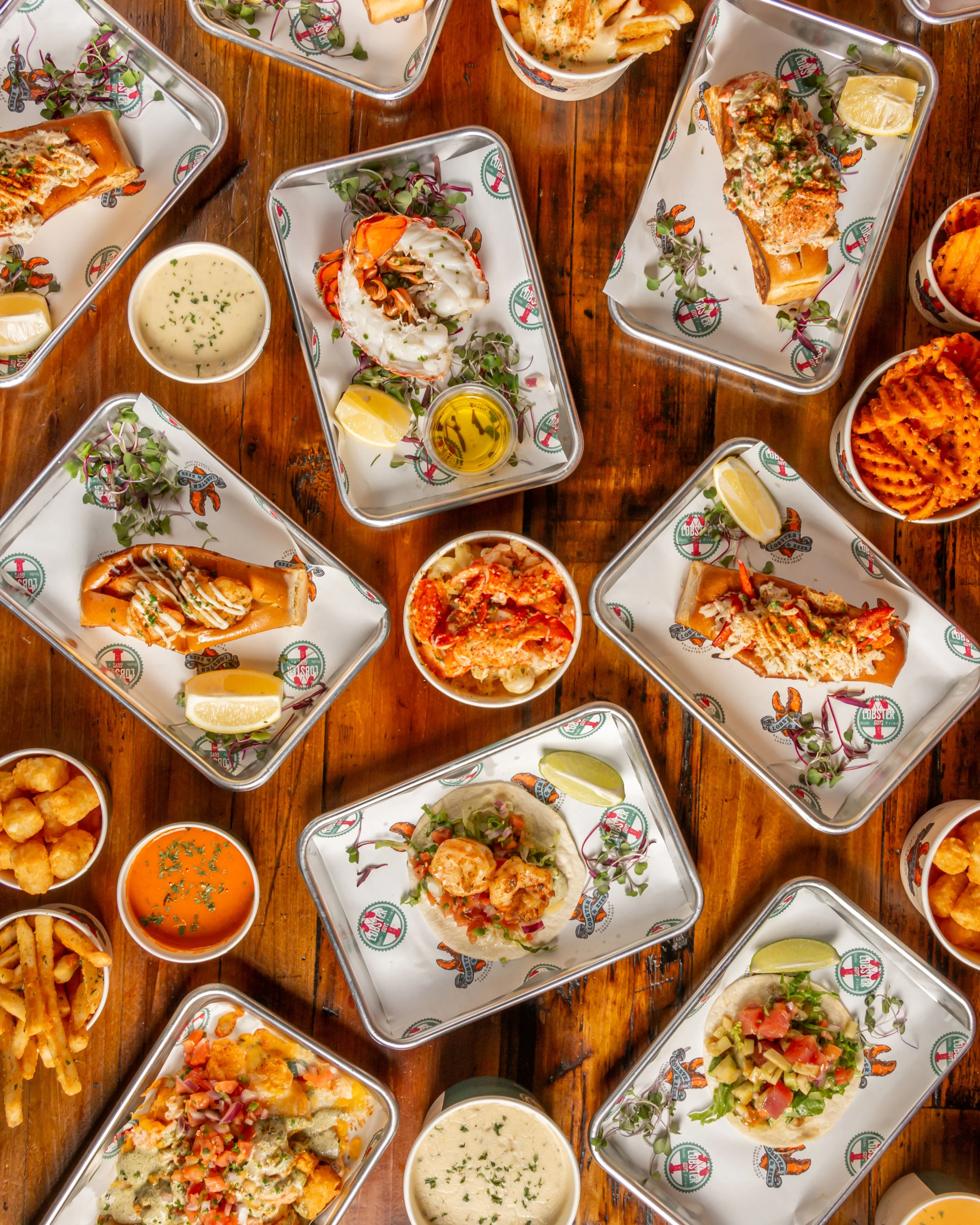 Assorted seafood tacos and dishes in a vibrant restaurant setting