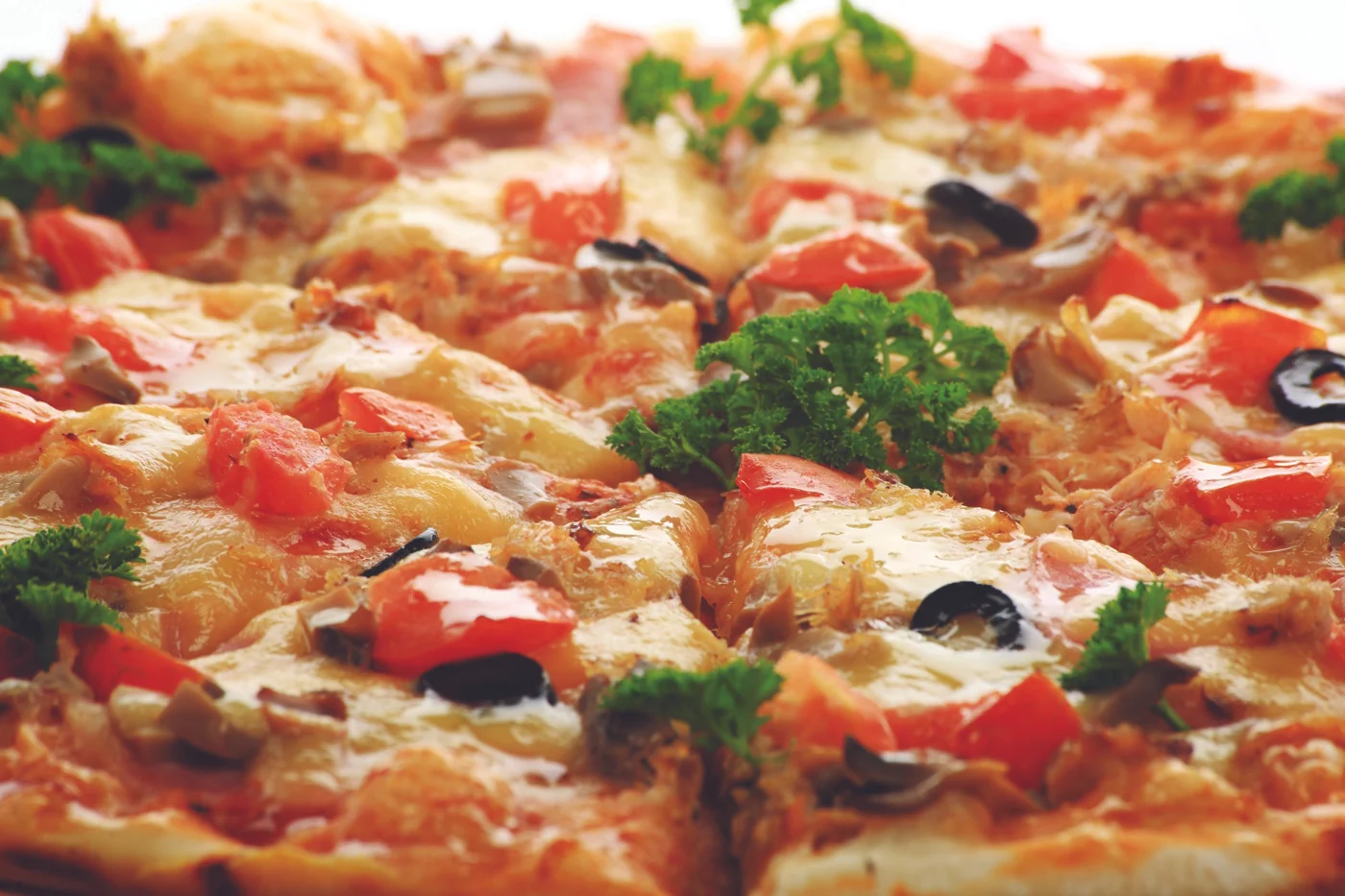 Delicious vegetarian pizza topped with fresh vegetables