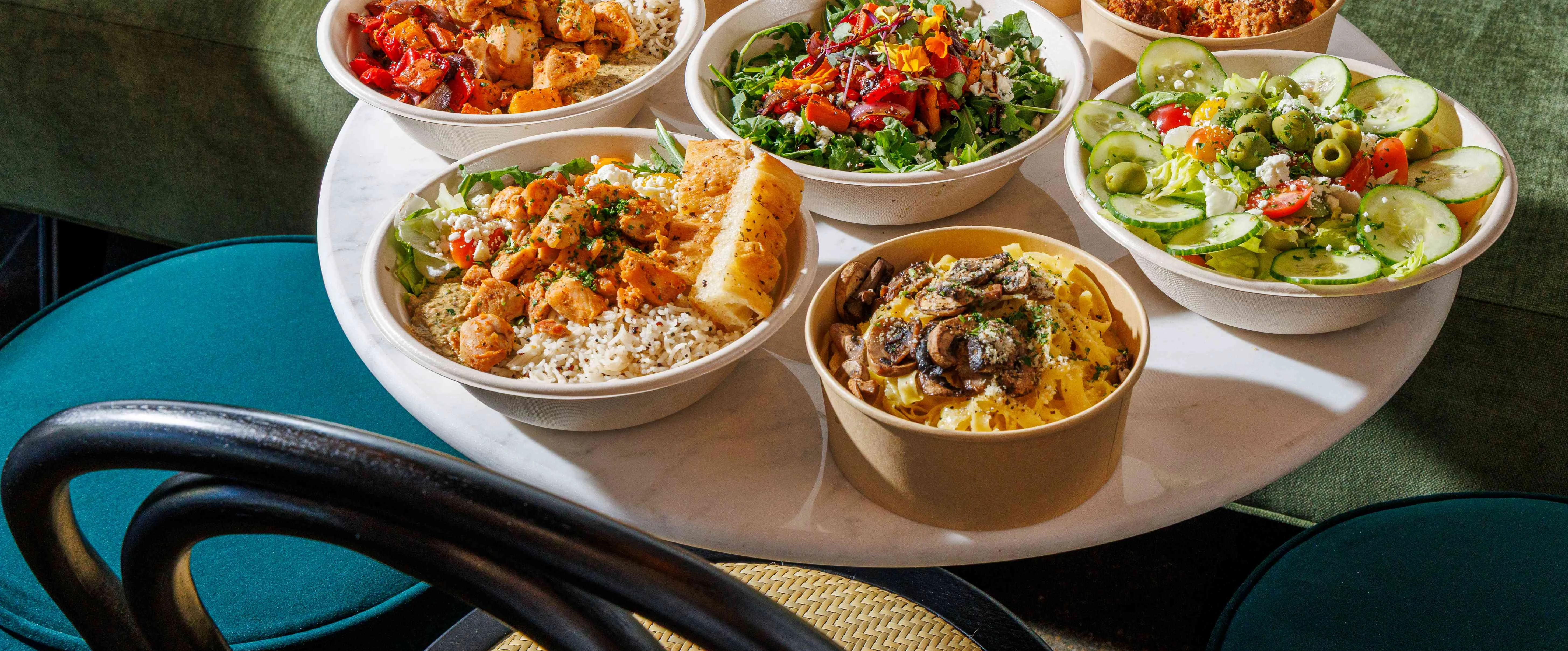 Assorted Mediterranean grain bowls with fresh ingredients